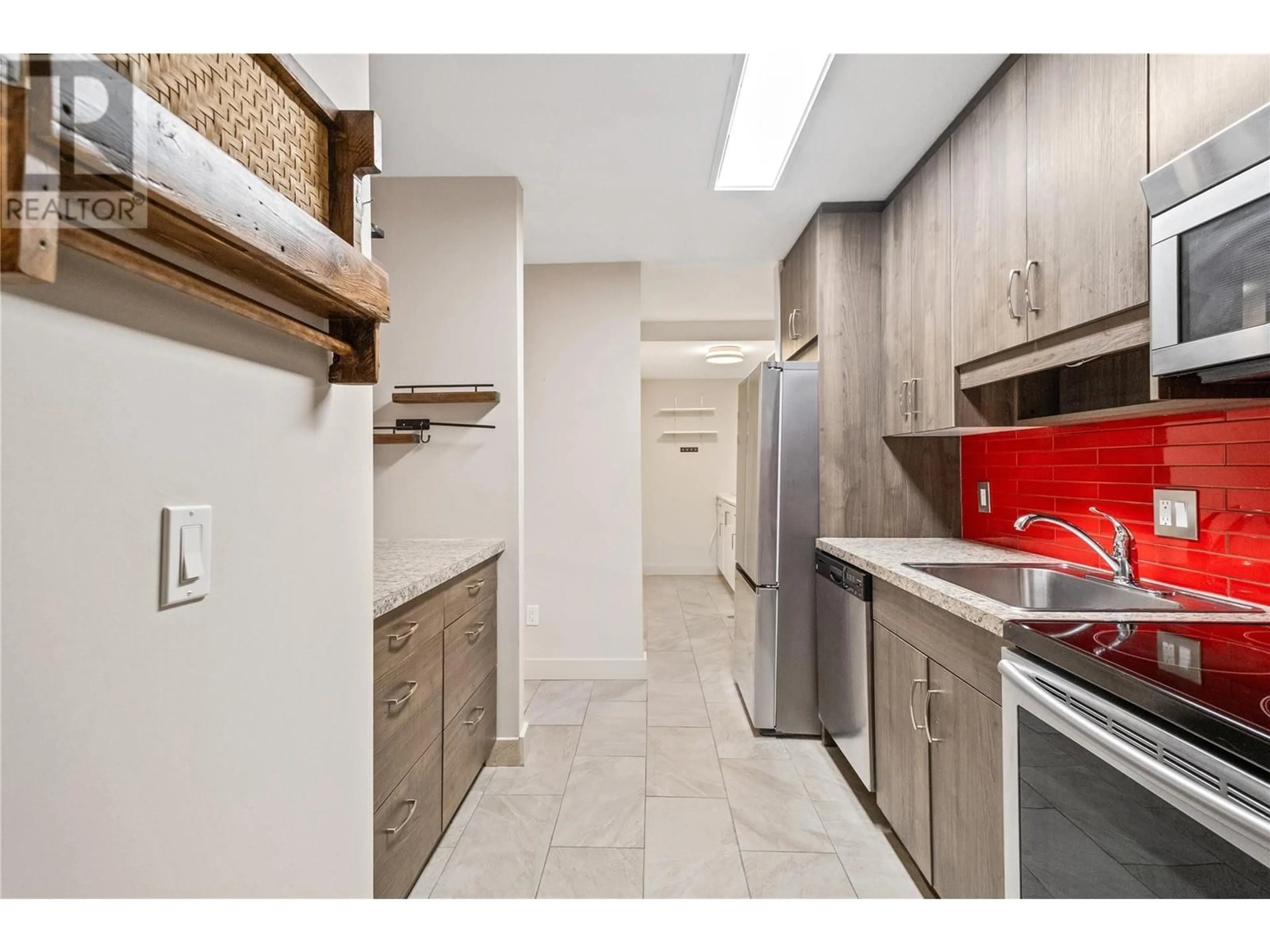Standard kitchen, ceramic/tile floor for 116 - 1640 UFTON COURT, Kelowna British Columbia V1Y8G7