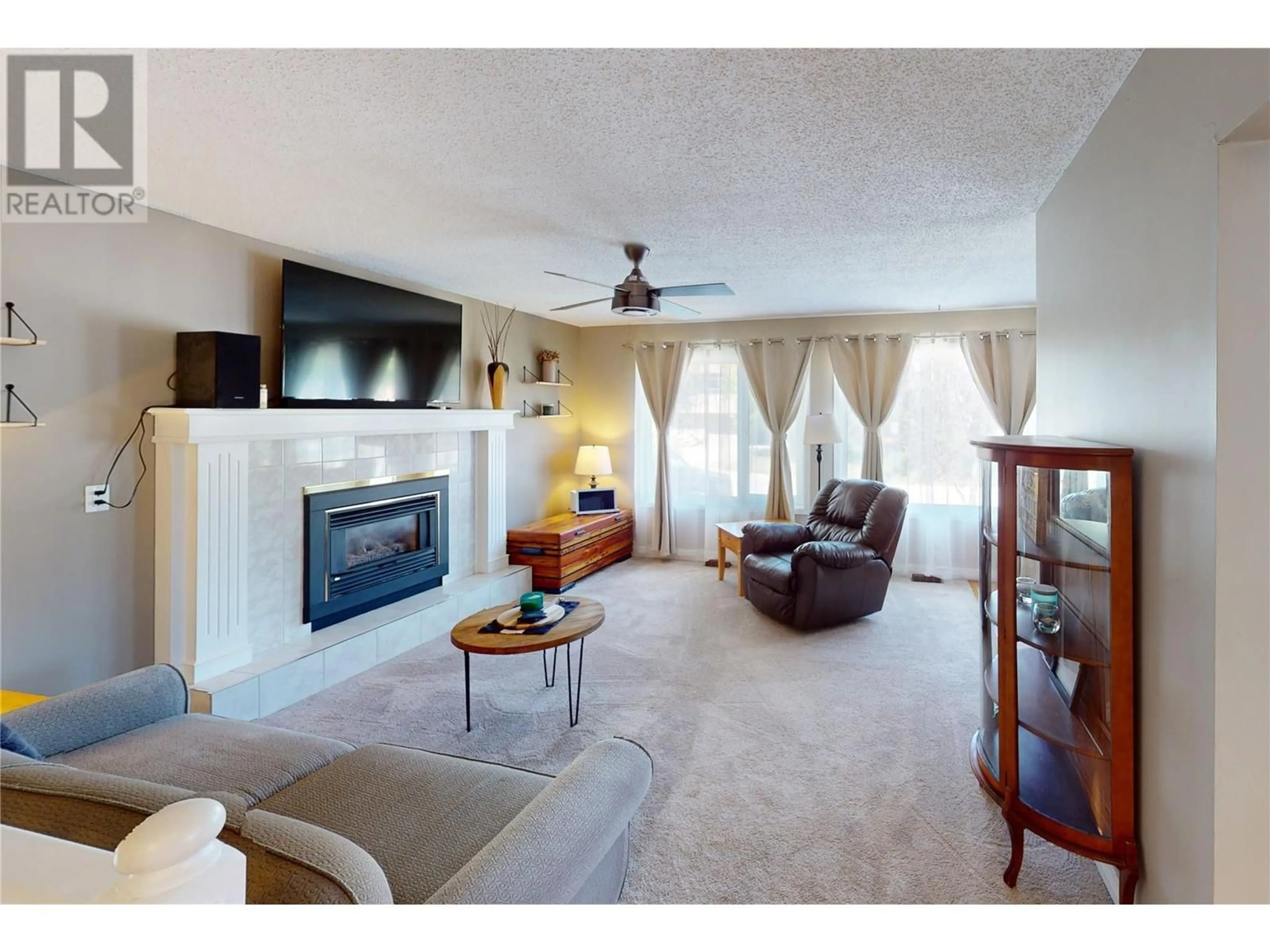 Living room with furniture, carpet floor for 1212 HICKORY CRESCENT, Sparwood British Columbia V0B2G2