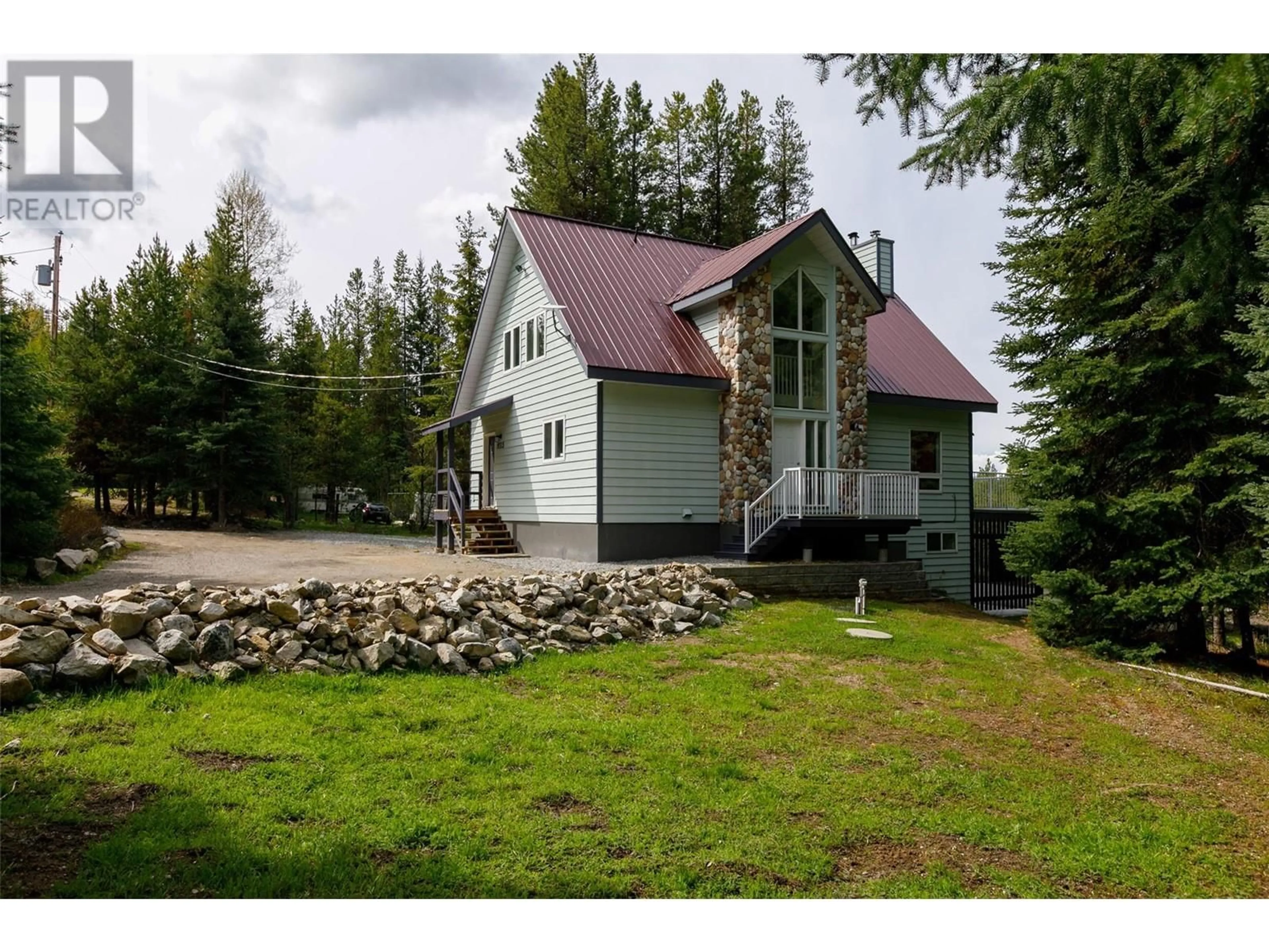 Home with vinyl exterior material, mountain view for 9315 PARADISE ROAD, Kelowna British Columbia V1P1K4