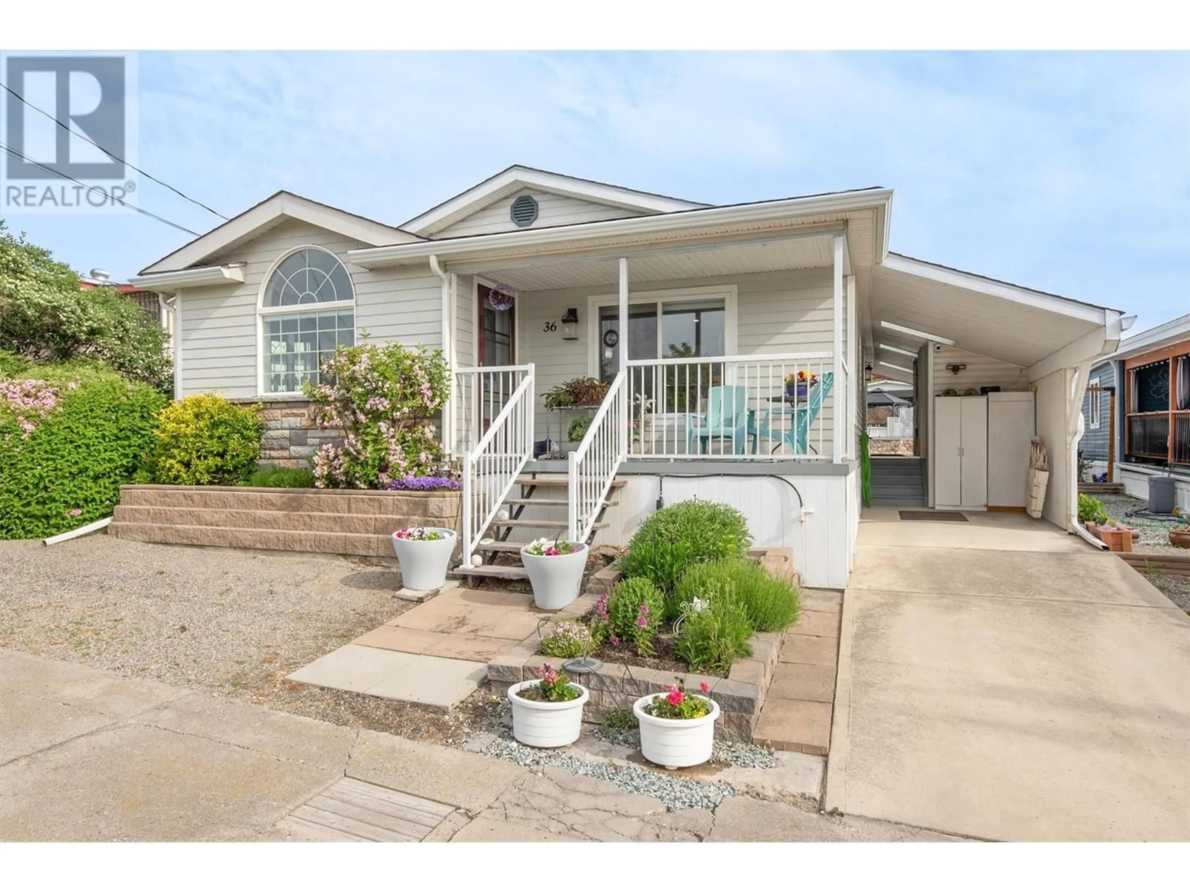 Home with vinyl exterior material, street for 36 - 2098 BOUCHERIE ROAD, West Kelowna British Columbia V4T2A5
