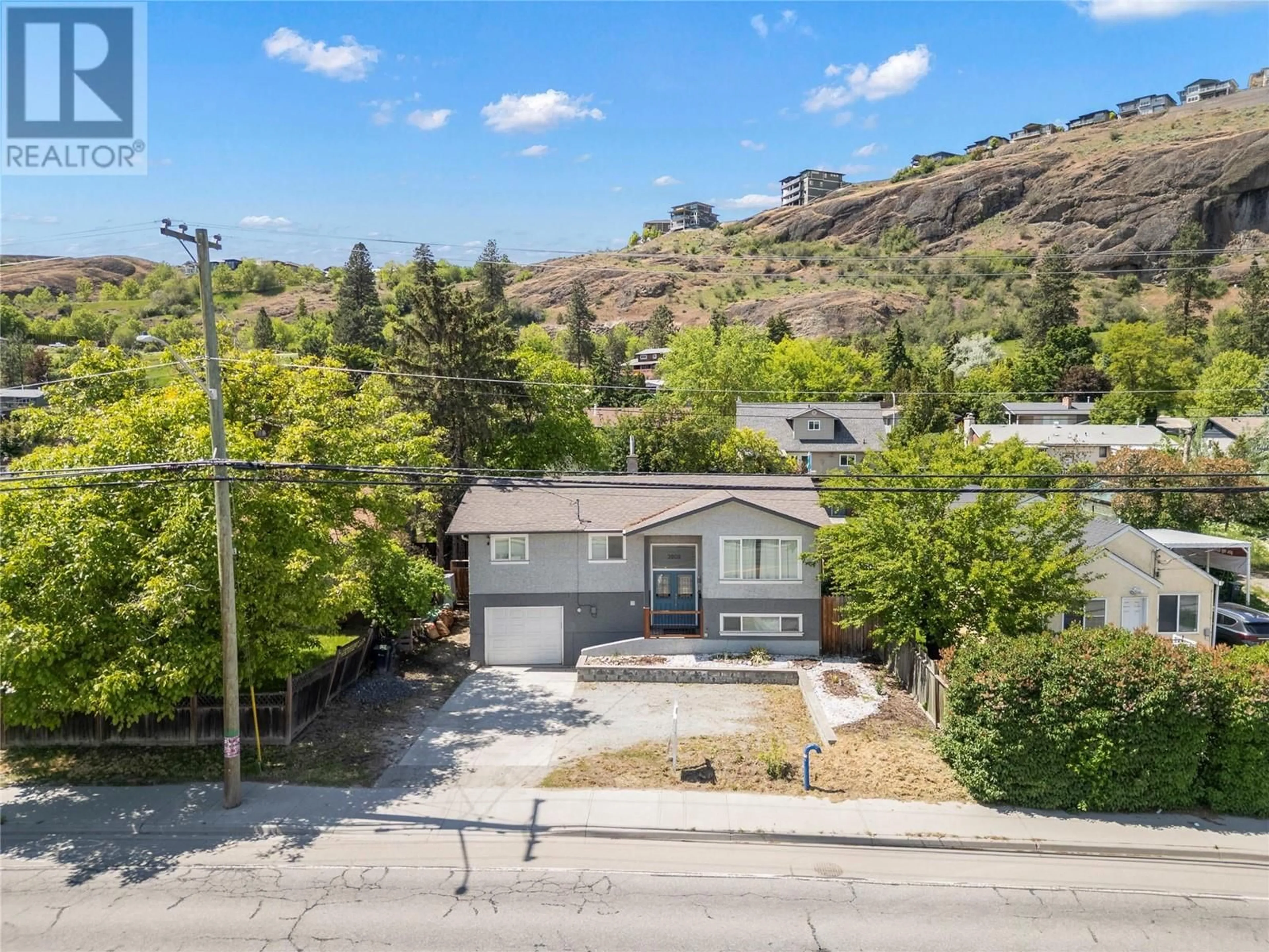 A pic from outside/outdoor area/front of a property/back of a property/a pic from drone, street for 3808 ALEXIS PARK DRIVE, Vernon British Columbia V1T6G9