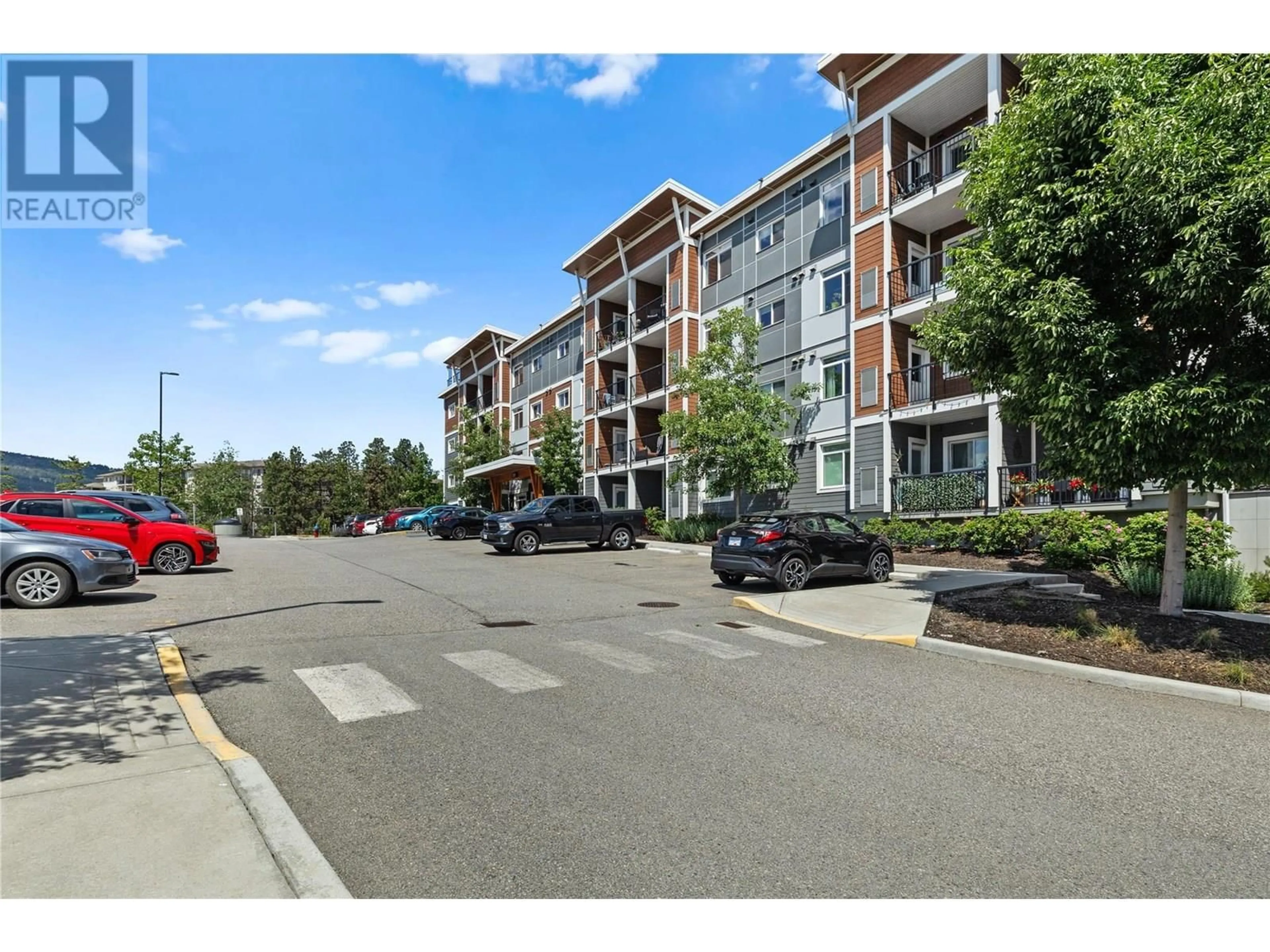 A pic from outside/outdoor area/front of a property/back of a property/a pic from drone, street for 303 - 2250 MAJOROS ROAD, West Kelowna British Columbia V4T0A6