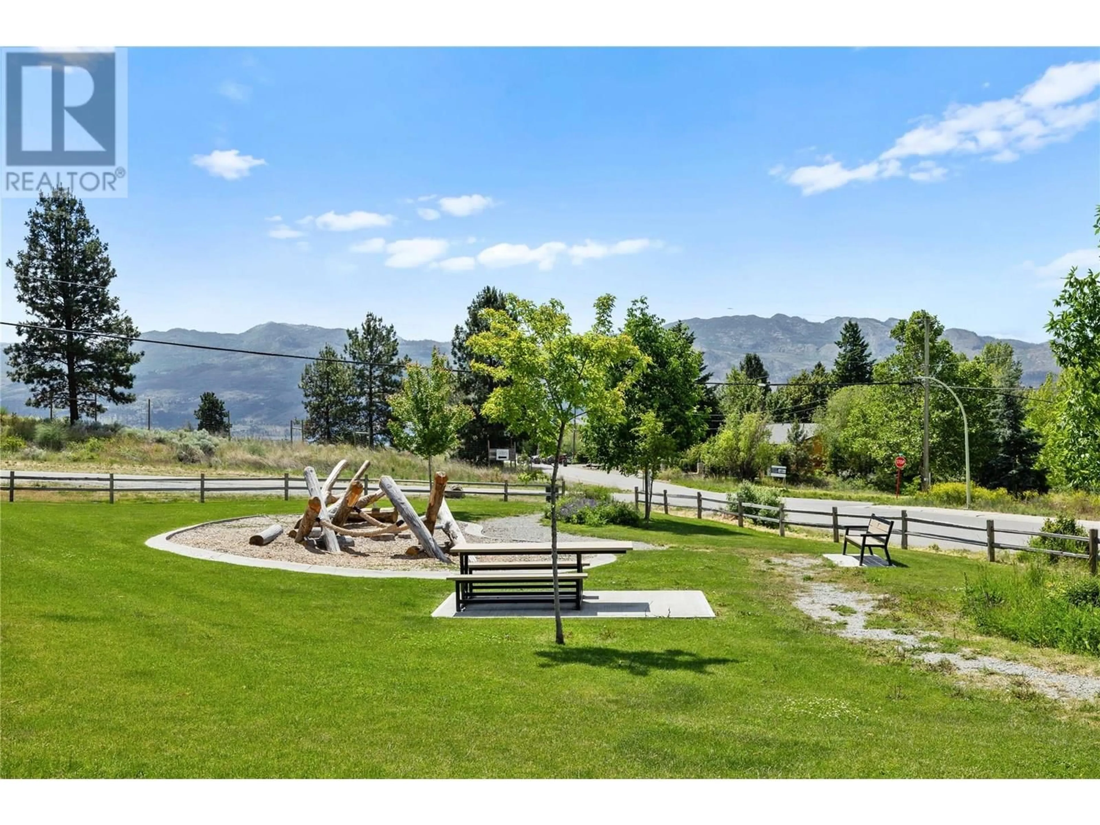 A pic from outside/outdoor area/front of a property/back of a property/a pic from drone, mountain view for 303 - 2250 MAJOROS ROAD, West Kelowna British Columbia V4T0A6