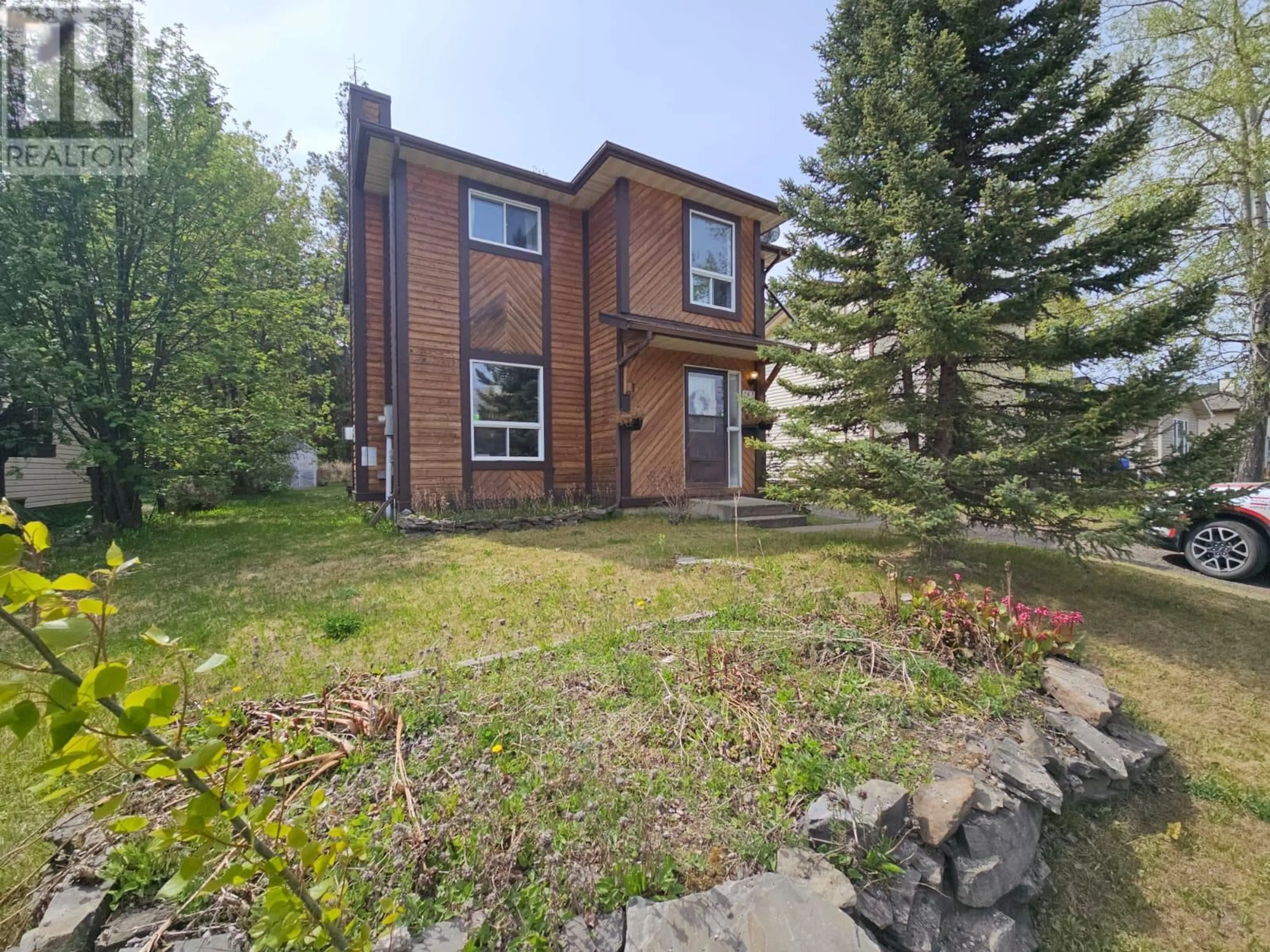 A pic from outside/outdoor area/front of a property/back of a property/a pic from drone, street for 167 ASH CRES OTHER, Tumbler Ridge British Columbia V0C2W0