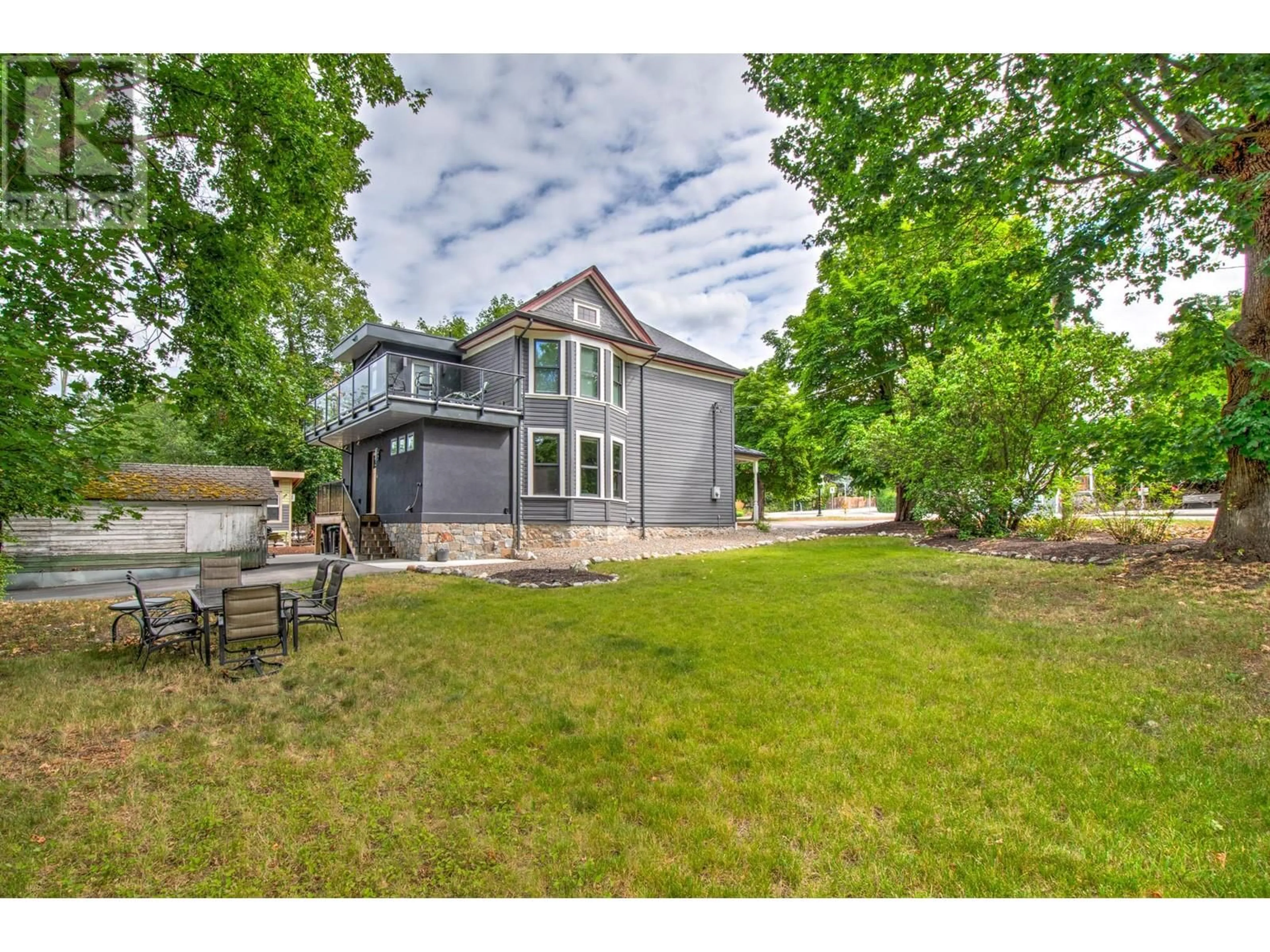A pic from outside/outdoor area/front of a property/back of a property/a pic from drone, unknown for 3102 PLEASANT VALLEY ROAD, Vernon British Columbia V1T4L3
