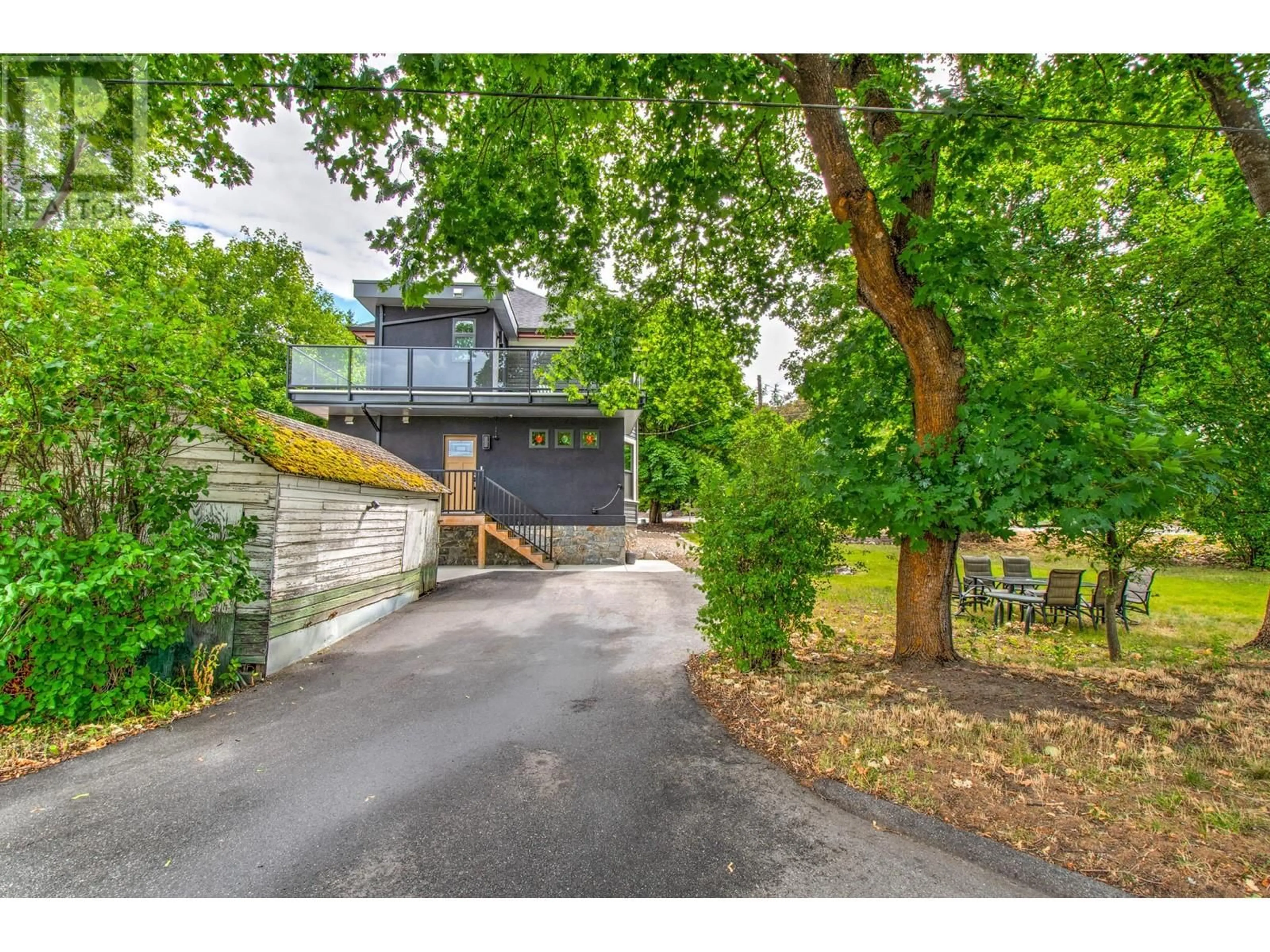 A pic from outside/outdoor area/front of a property/back of a property/a pic from drone, street for 3102 PLEASANT VALLEY ROAD, Vernon British Columbia V1T4L3