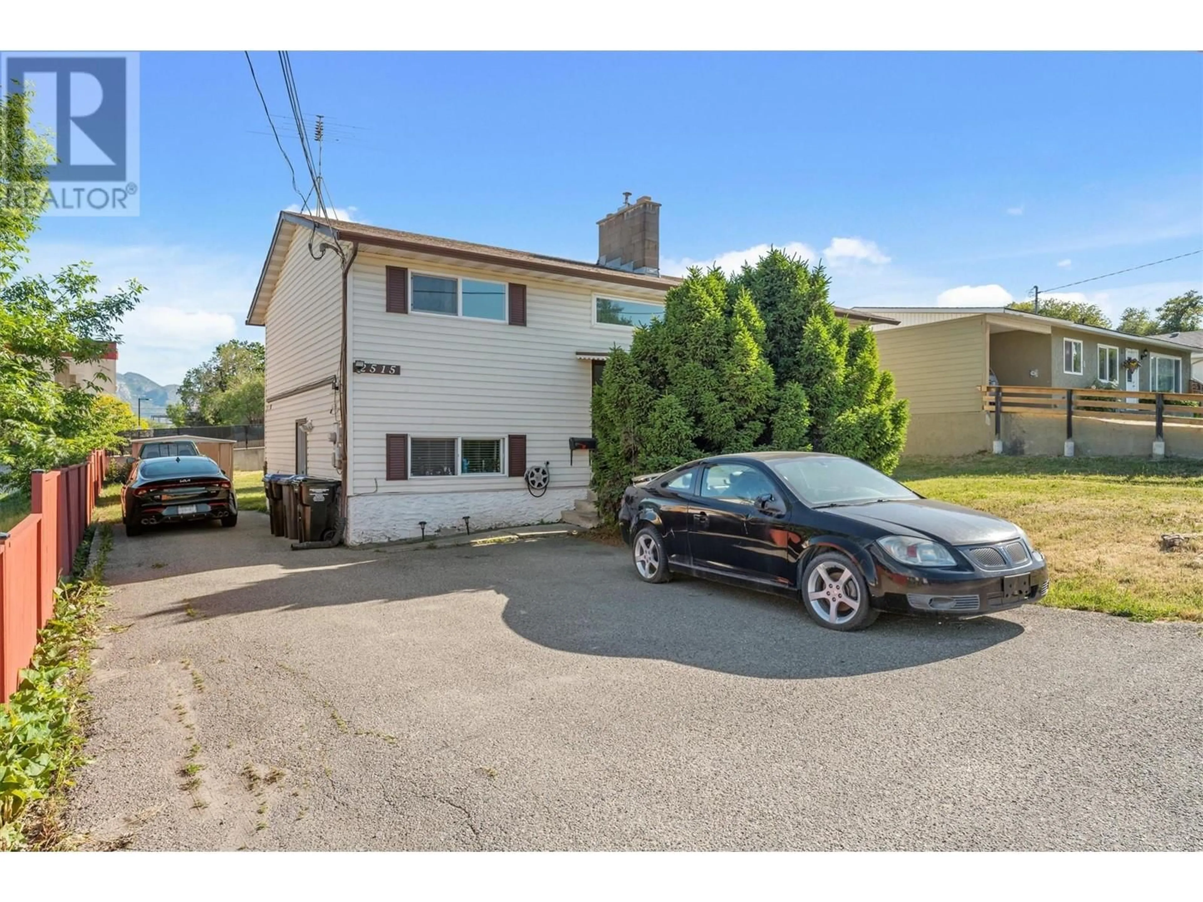 A pic from outside/outdoor area/front of a property/back of a property/a pic from drone, street for 2515 DELRAY ROAD, West Kelowna British Columbia V4T1P9