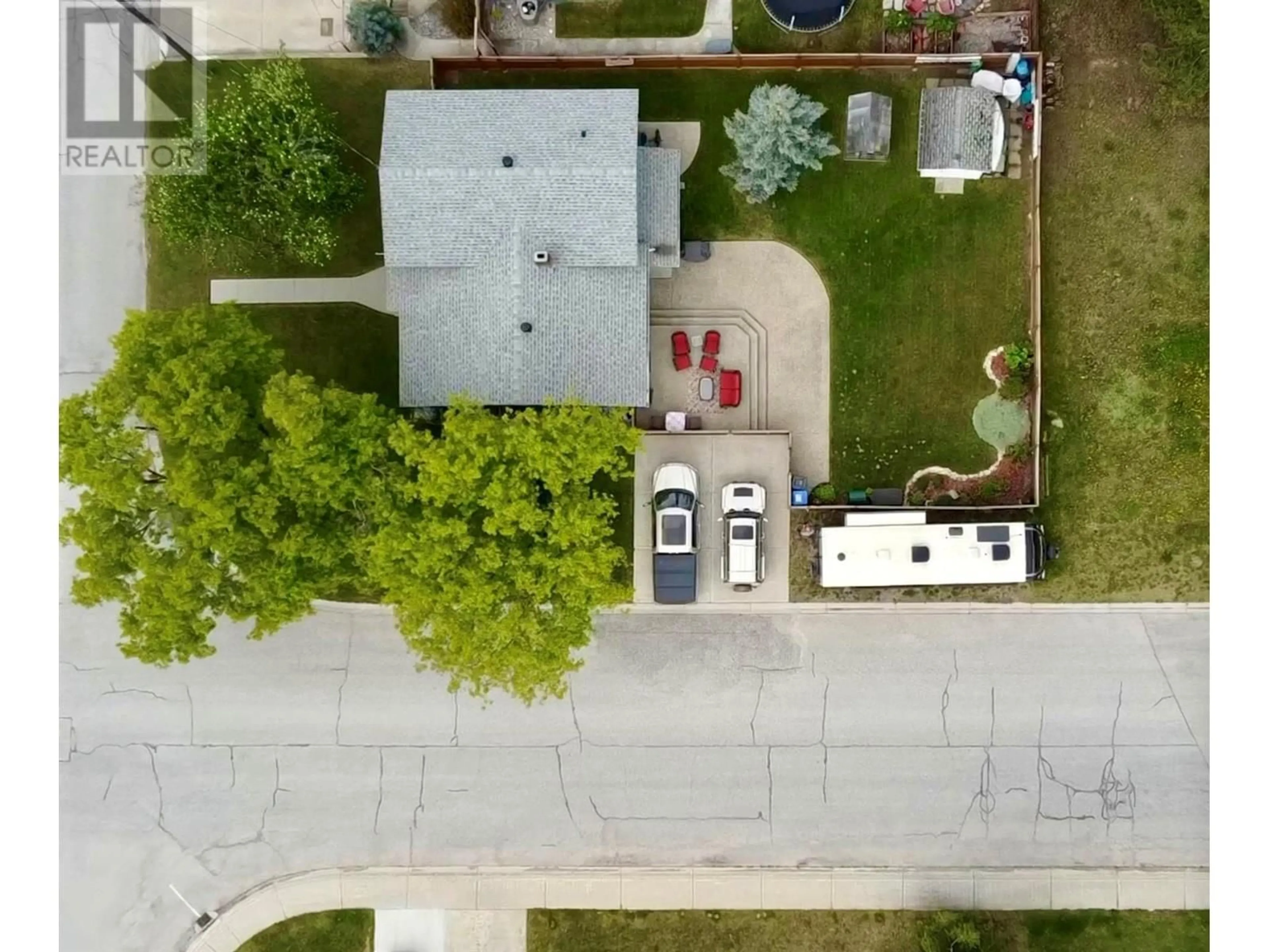 A pic from outside/outdoor area/front of a property/back of a property/a pic from drone, street for 1440 BIRCH CRESCENT, Golden British Columbia V0A1H6