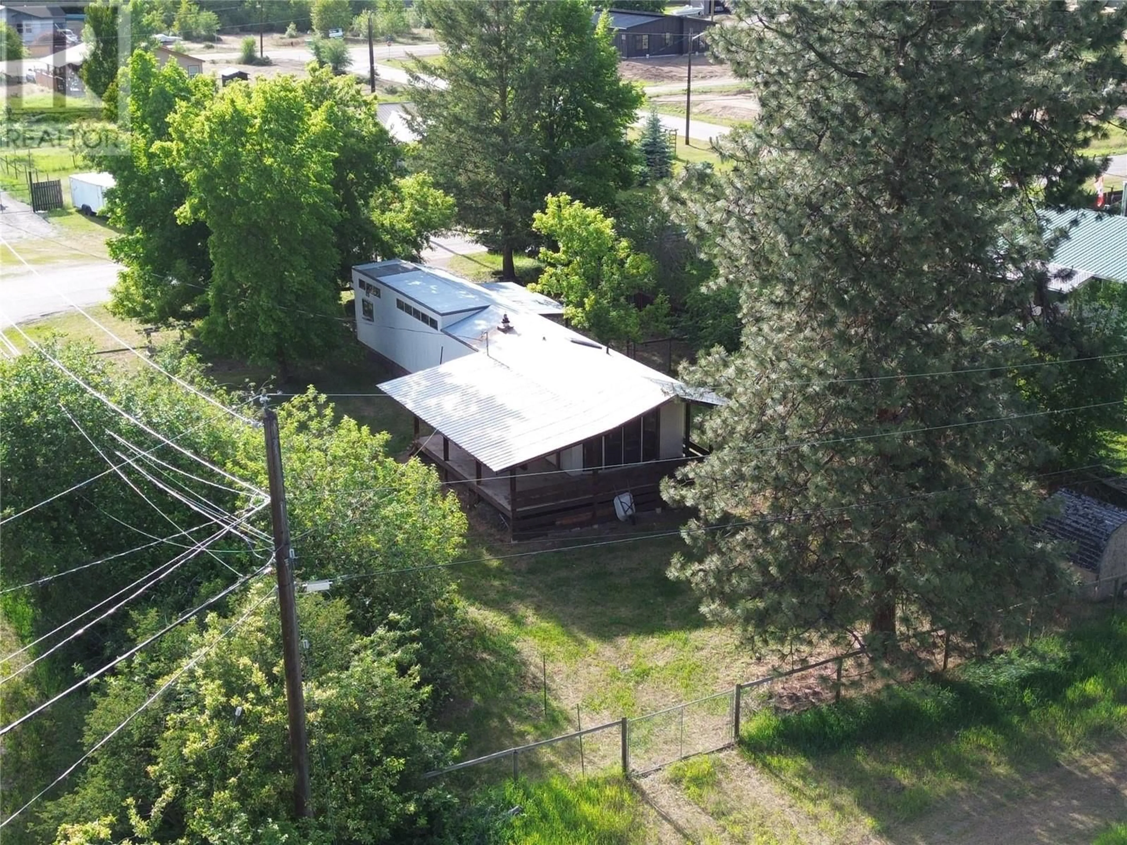 A pic from outside/outdoor area/front of a property/back of a property/a pic from drone, unknown for 5930 18TH STREET, Grand Forks British Columbia V0H1H0