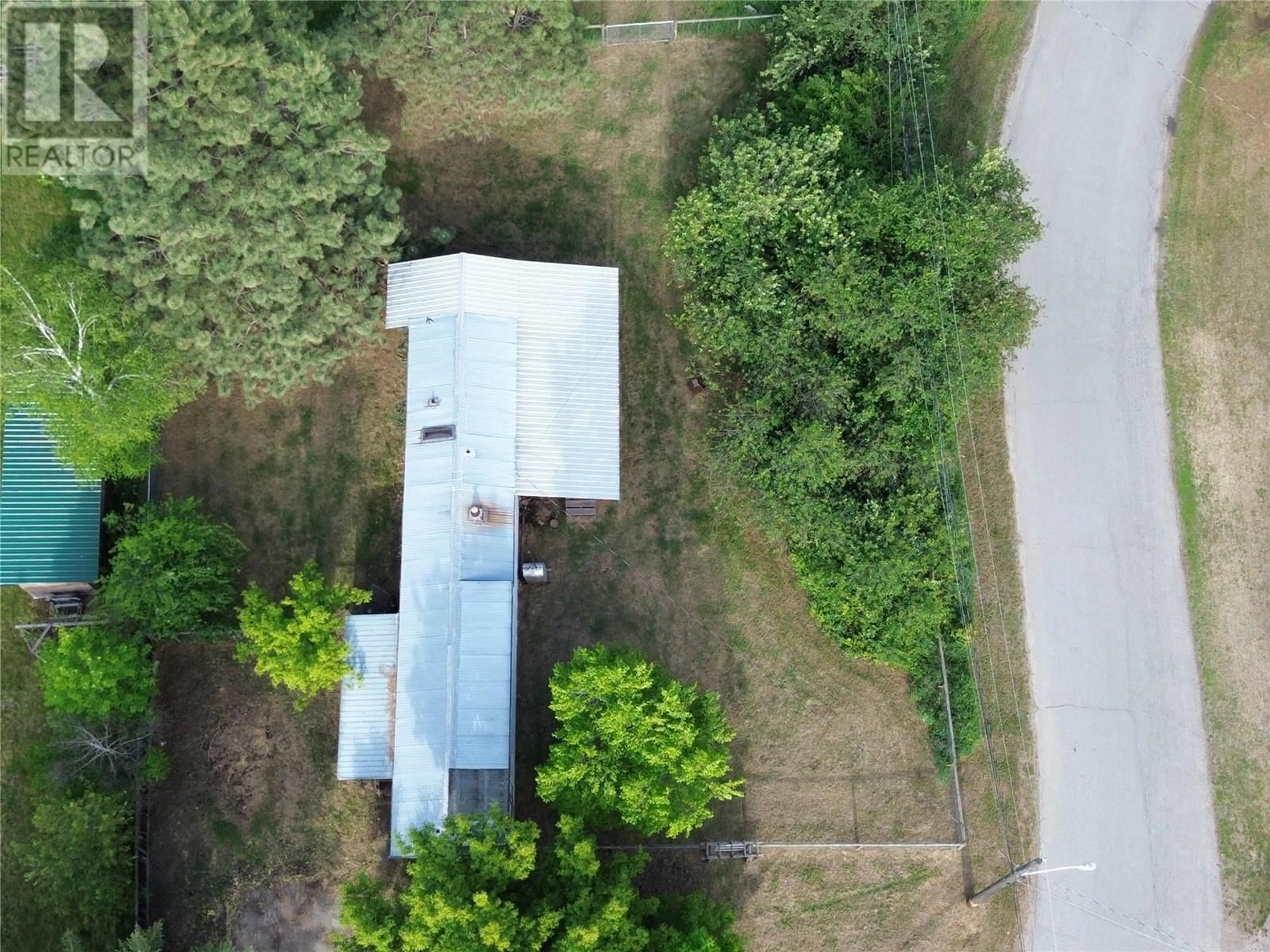 A pic from outside/outdoor area/front of a property/back of a property/a pic from drone, unknown for 5930 18TH STREET, Grand Forks British Columbia V0H1H0
