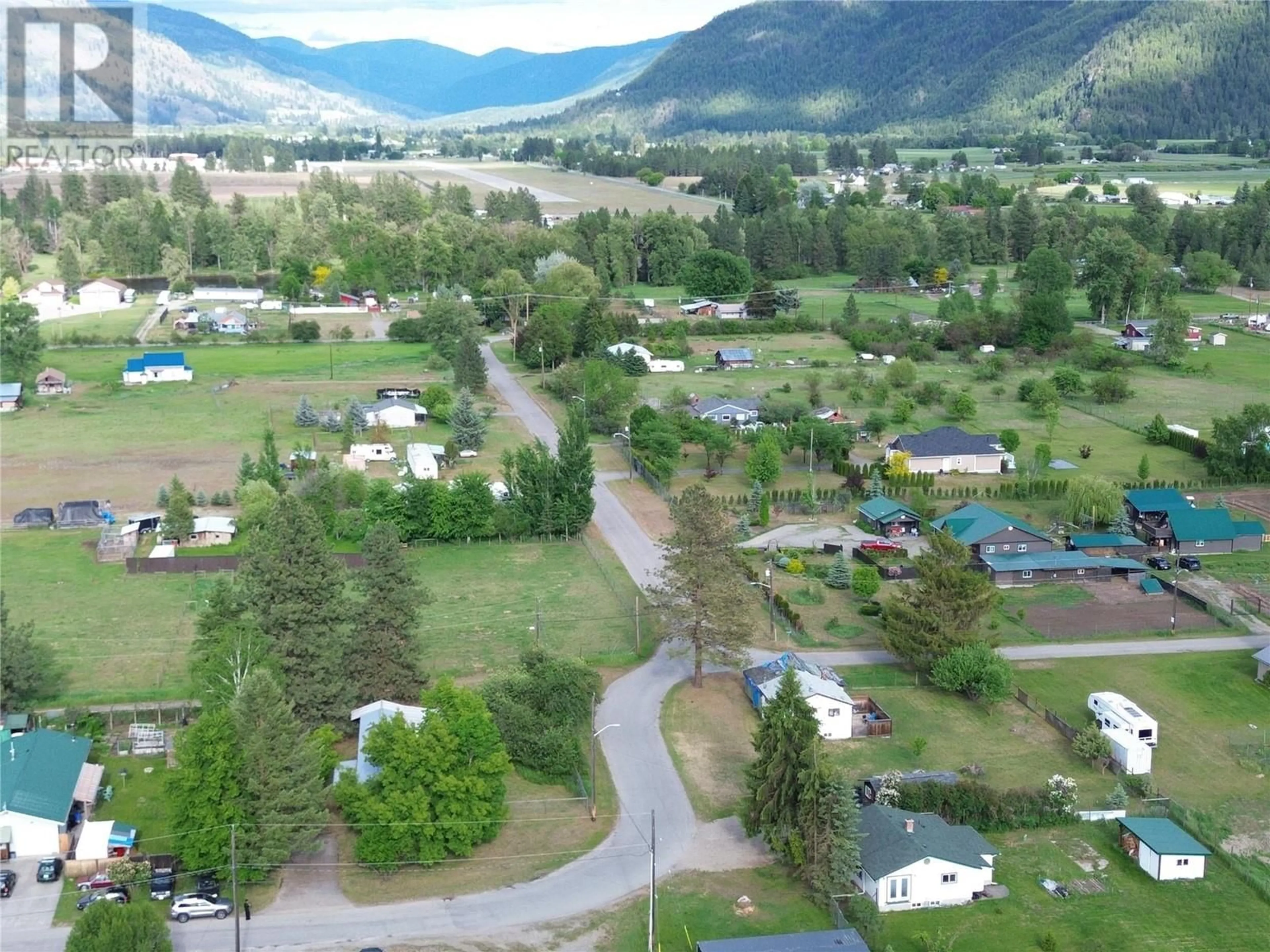 A pic from outside/outdoor area/front of a property/back of a property/a pic from drone, mountain view for 5930 18TH STREET, Grand Forks British Columbia V0H1H0