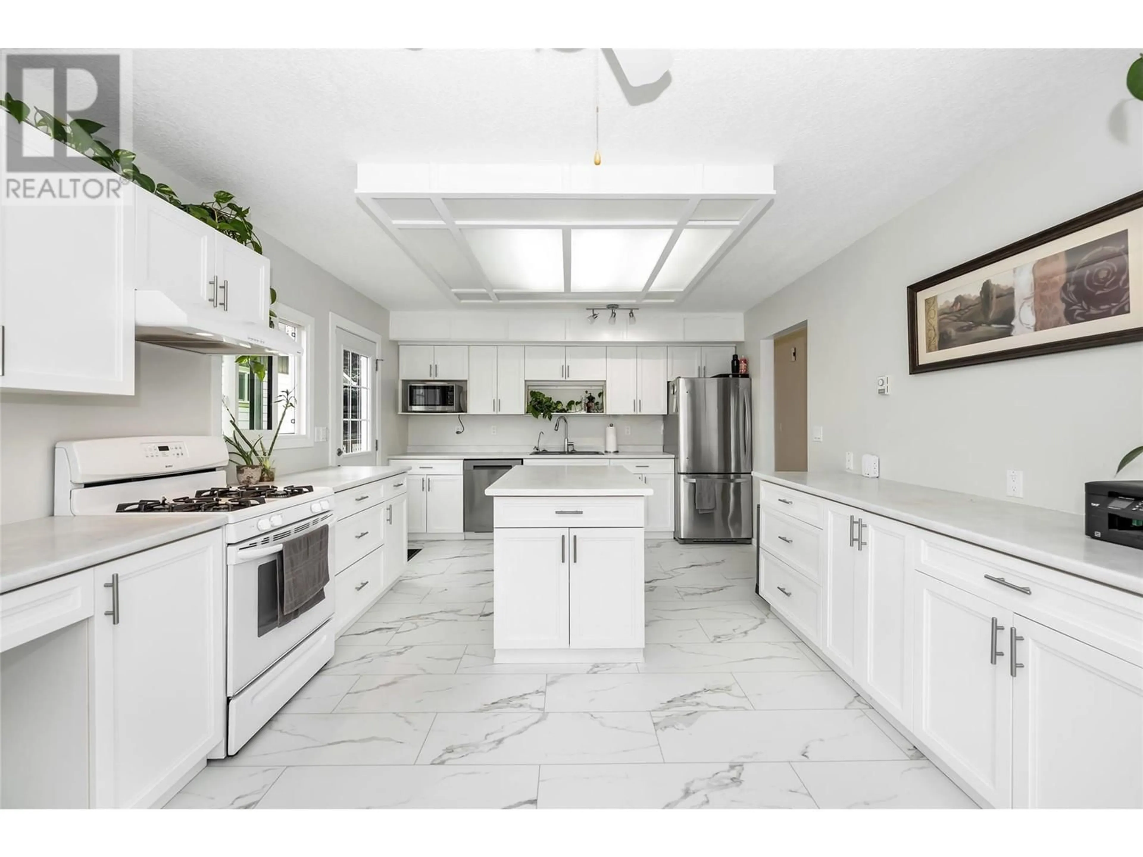 Open concept kitchen, ceramic/tile floor for 5844 PLEASANT VALLEY ROAD, Vernon British Columbia V1B3L6