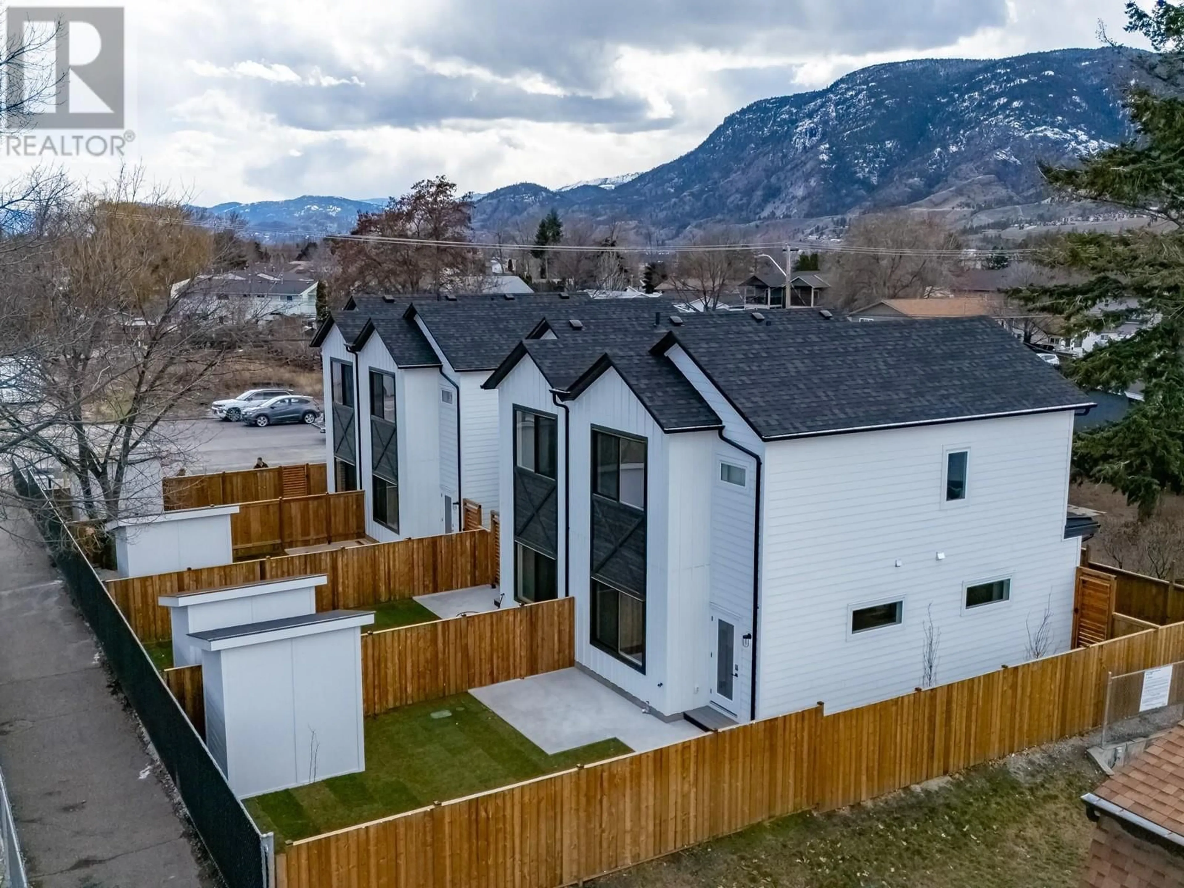 A pic from outside/outdoor area/front of a property/back of a property/a pic from drone, mountain view for 103 - 275 KINNEY AVENUE, Penticton British Columbia V2A3P3