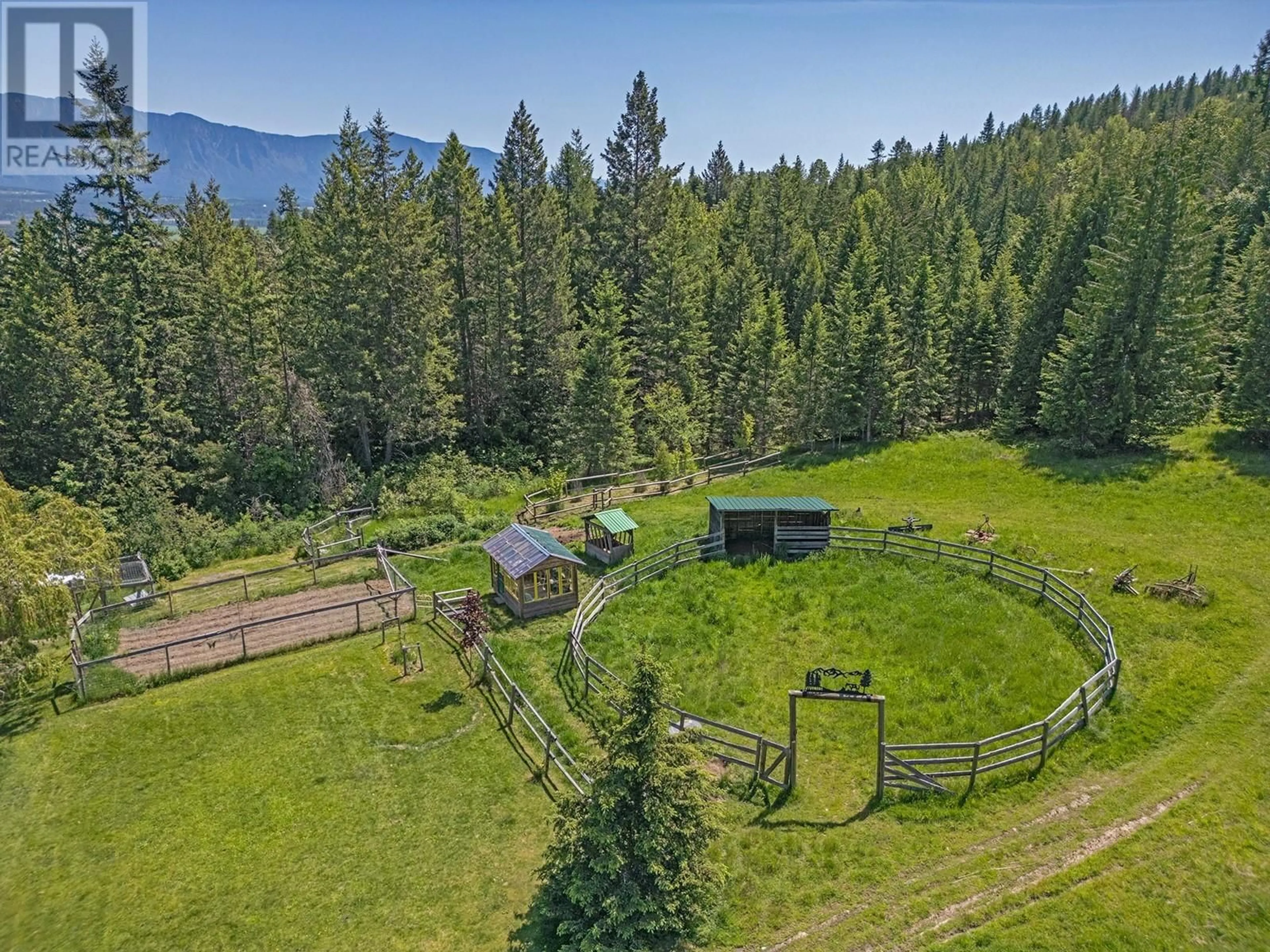 A pic from outside/outdoor area/front of a property/back of a property/a pic from drone, forest/trees view for 2033 SMITH ROAD, Creston British Columbia V0B1G7