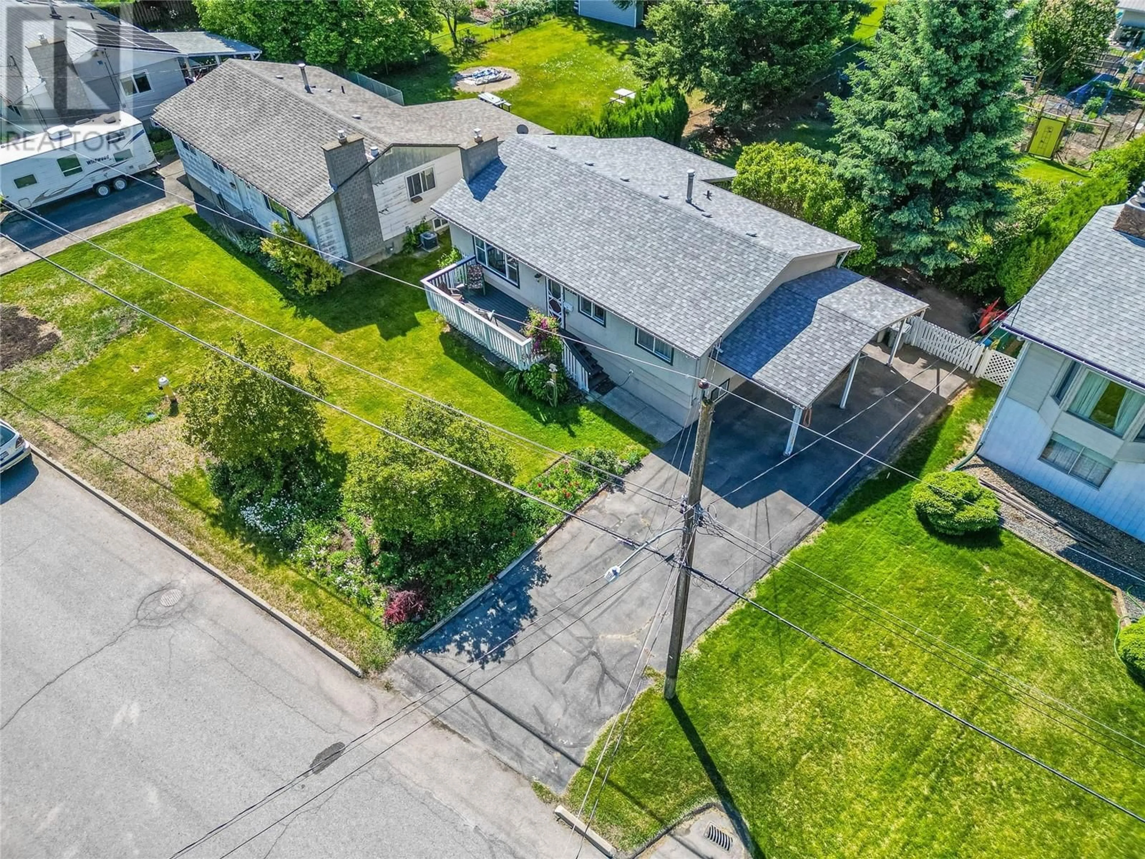 A pic from outside/outdoor area/front of a property/back of a property/a pic from drone, street for 747 KYLE DRIVE, Kamloops British Columbia V2B7Z5