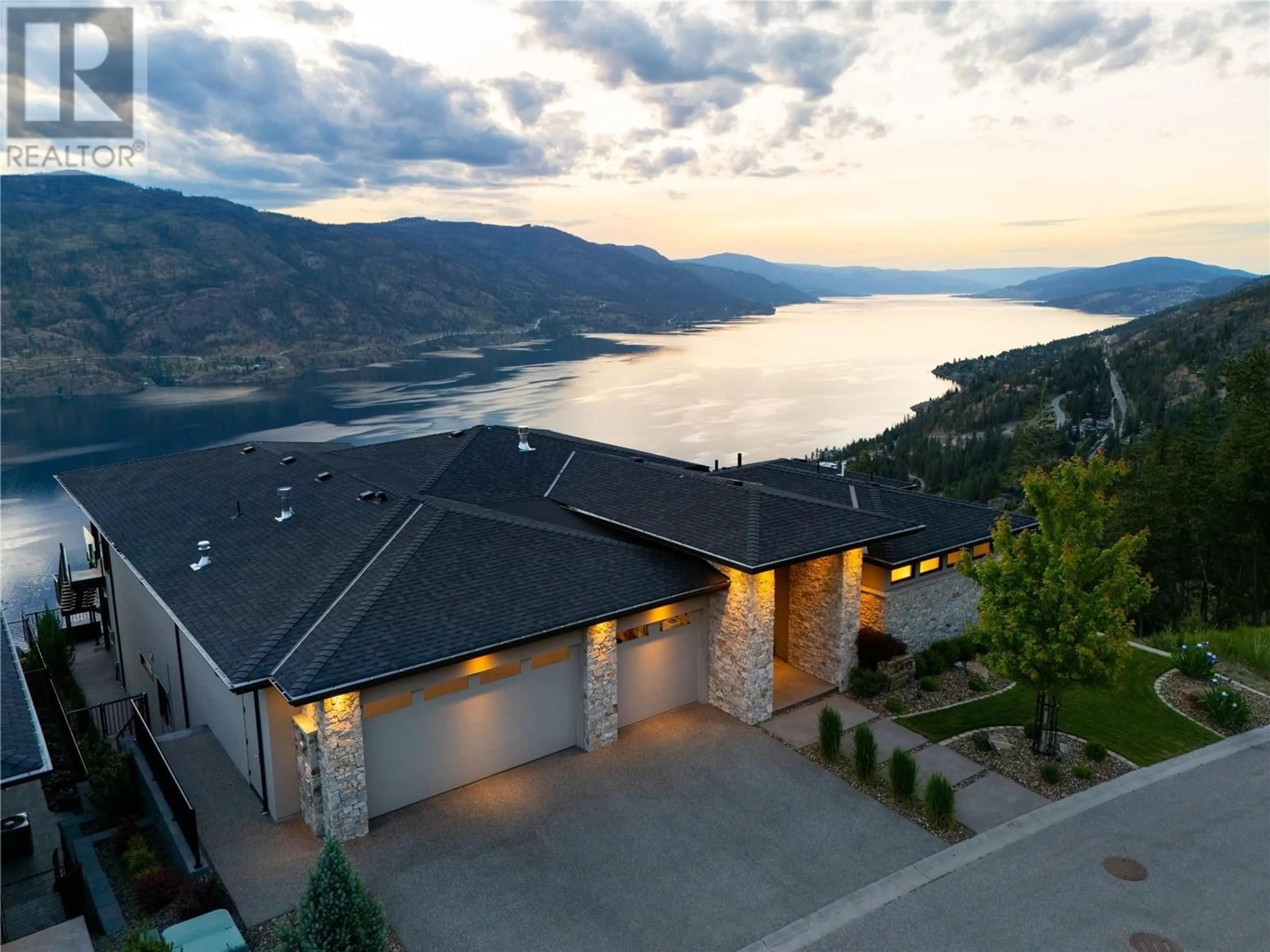 A pic from outside/outdoor area/front of a property/back of a property/a pic from drone, water/lake/river/ocean view for 140 RED SKY PLACE, Kelowna British Columbia V1V3E3
