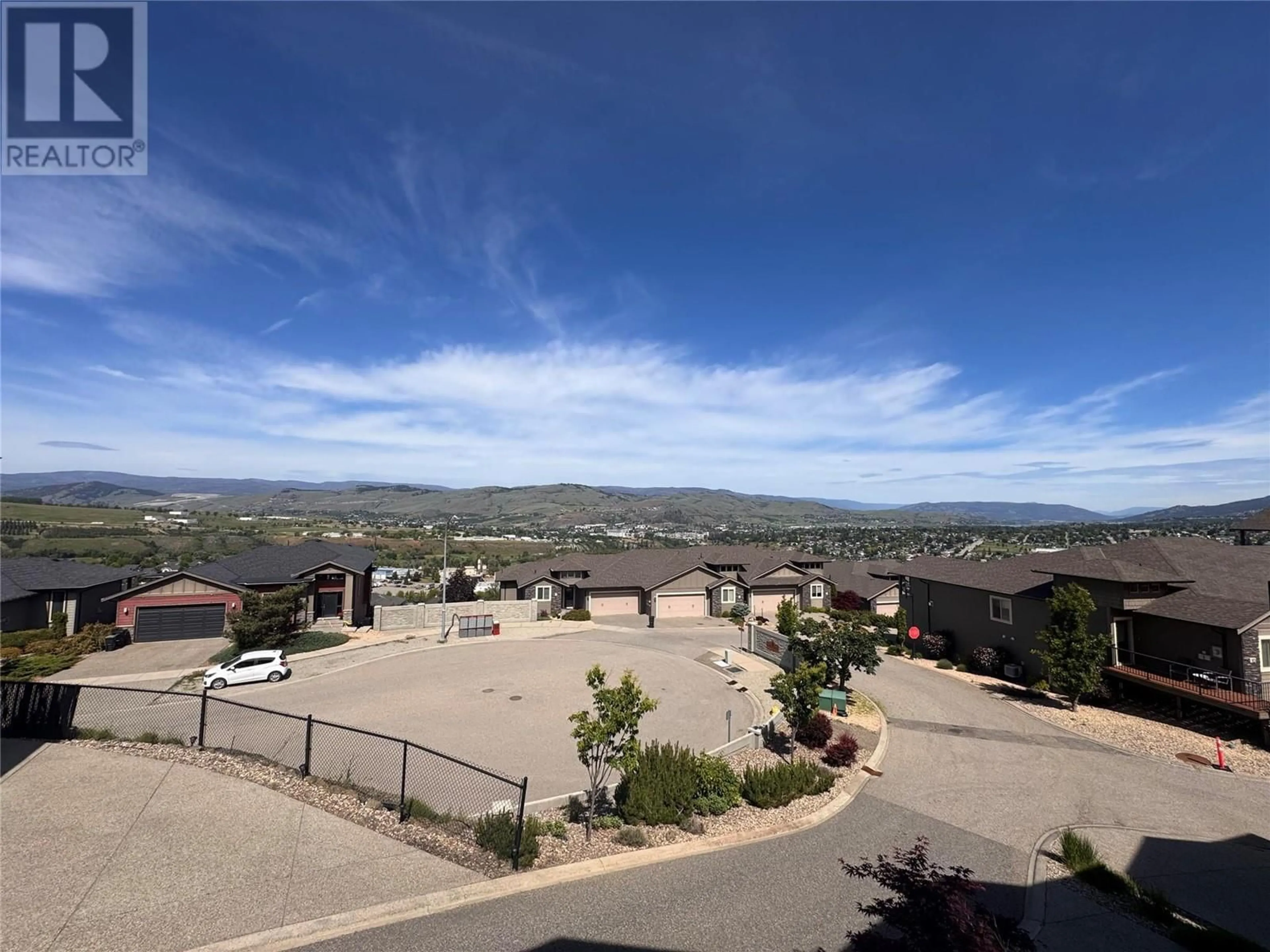 A pic from outside/outdoor area/front of a property/back of a property/a pic from drone, mountain view for 29 - 1040 MT.REVELSTOKE PLACE, Vernon British Columbia V1B4E3
