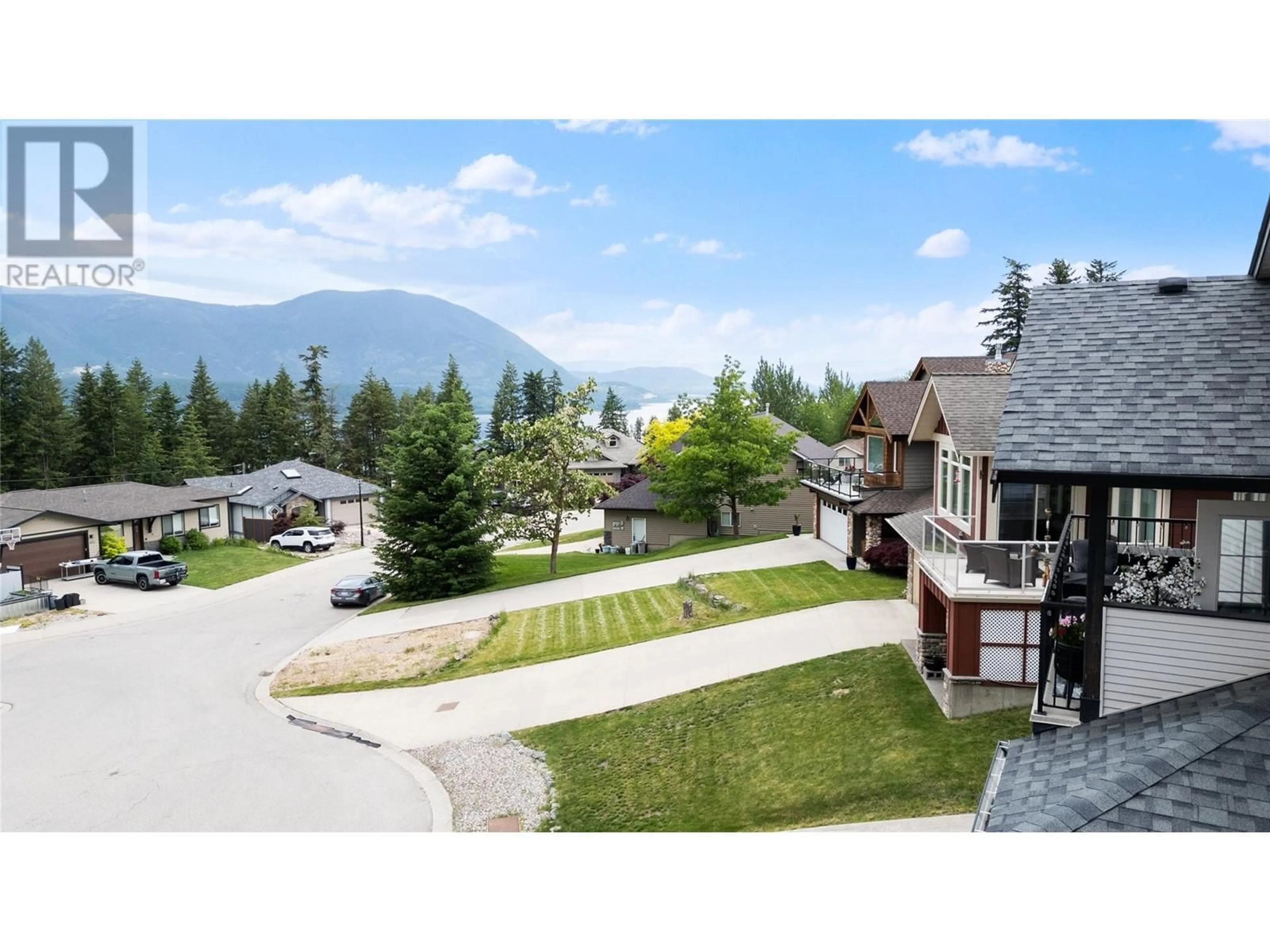 A pic from outside/outdoor area/front of a property/back of a property/a pic from drone, mountain view for 1040 14 AVENUE SOUTHEAST, Salmon Arm British Columbia V1E2R6