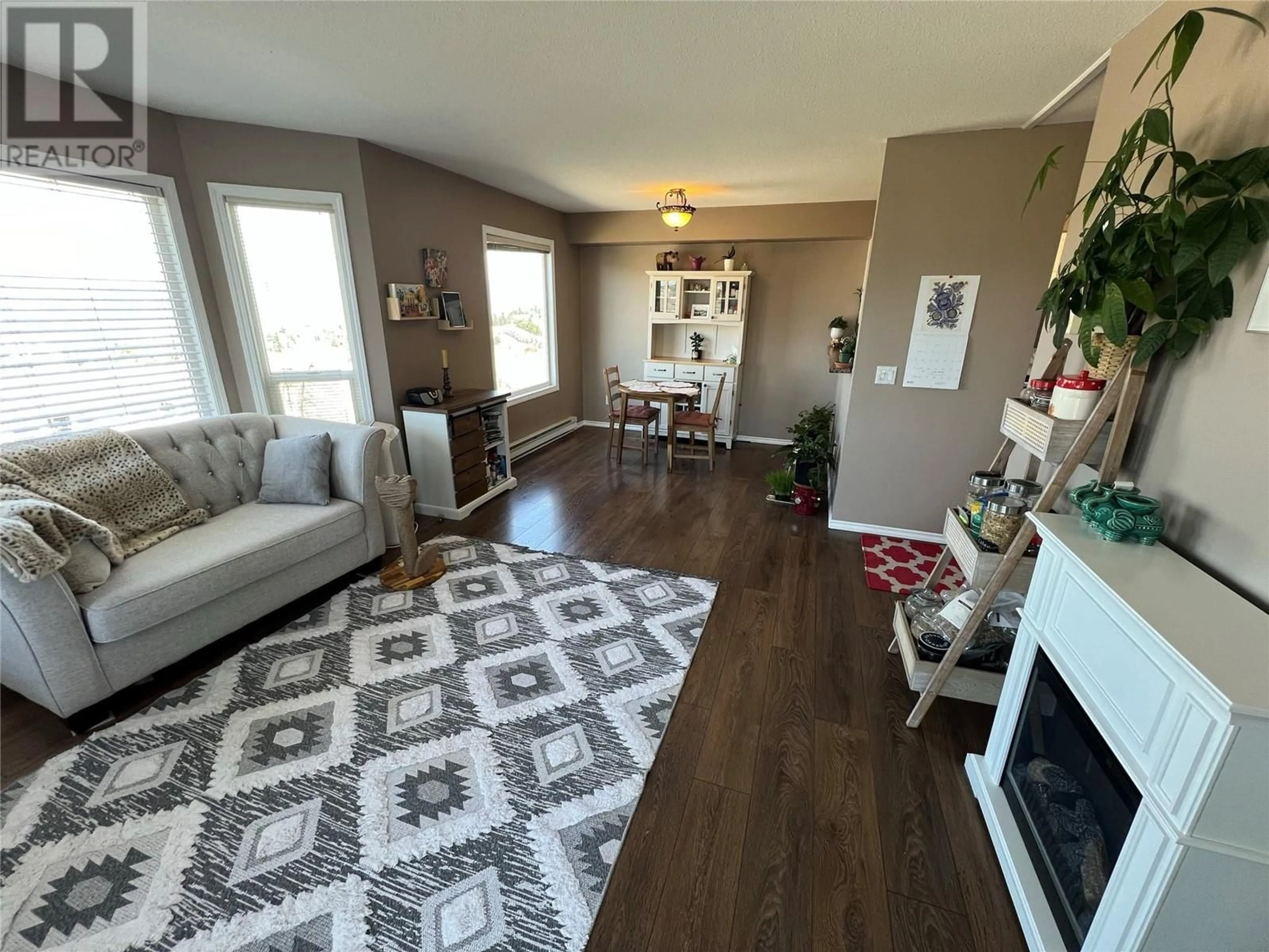 Living room with furniture, wood/laminate floor for AAA CONFIDENTIAL DRIVE, Kamloops British Columbia V1S1T5