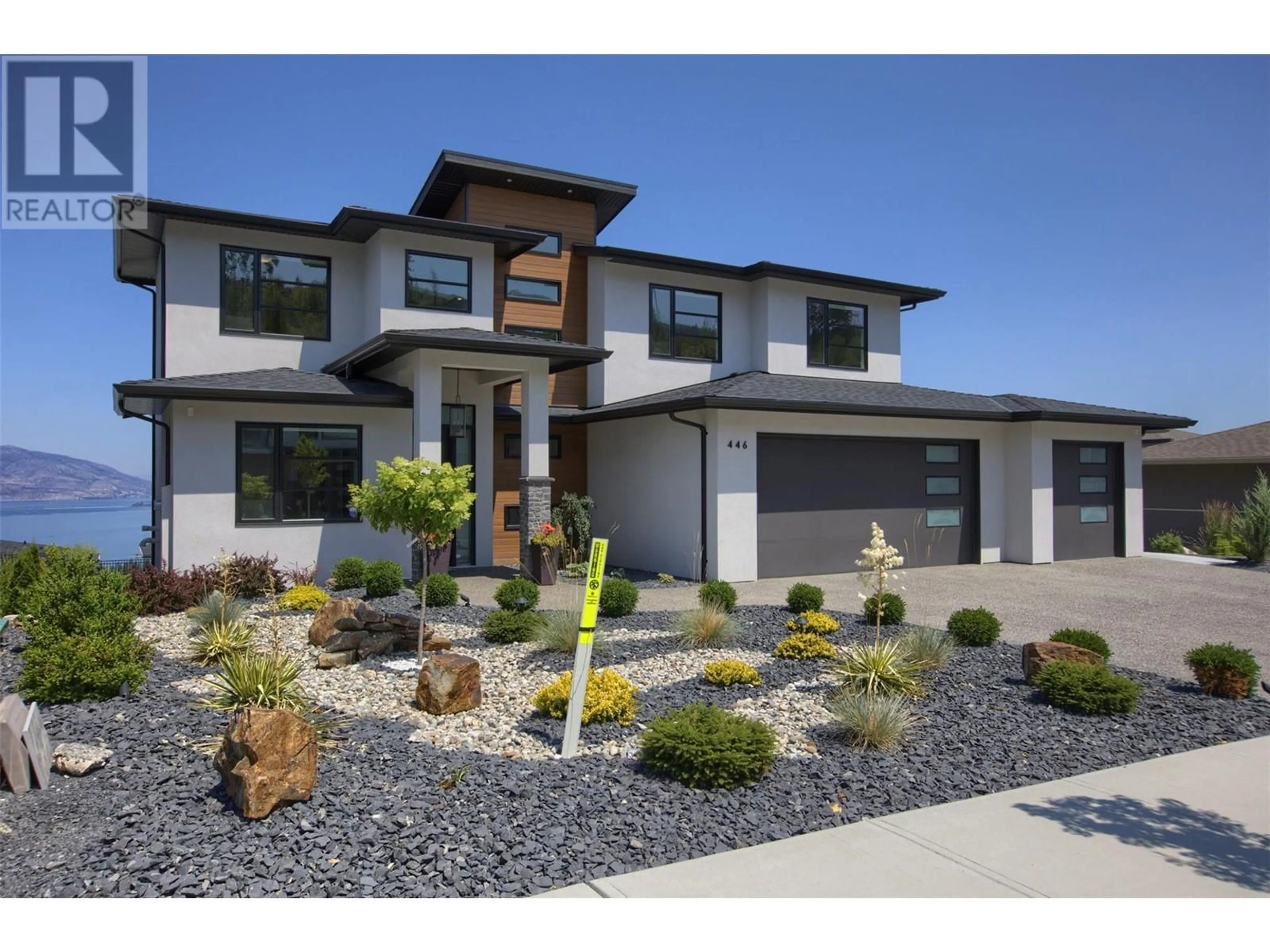 Home with vinyl exterior material, street for 446 HAWK HILL DRIVE, Kelowna British Columbia V1W0B1