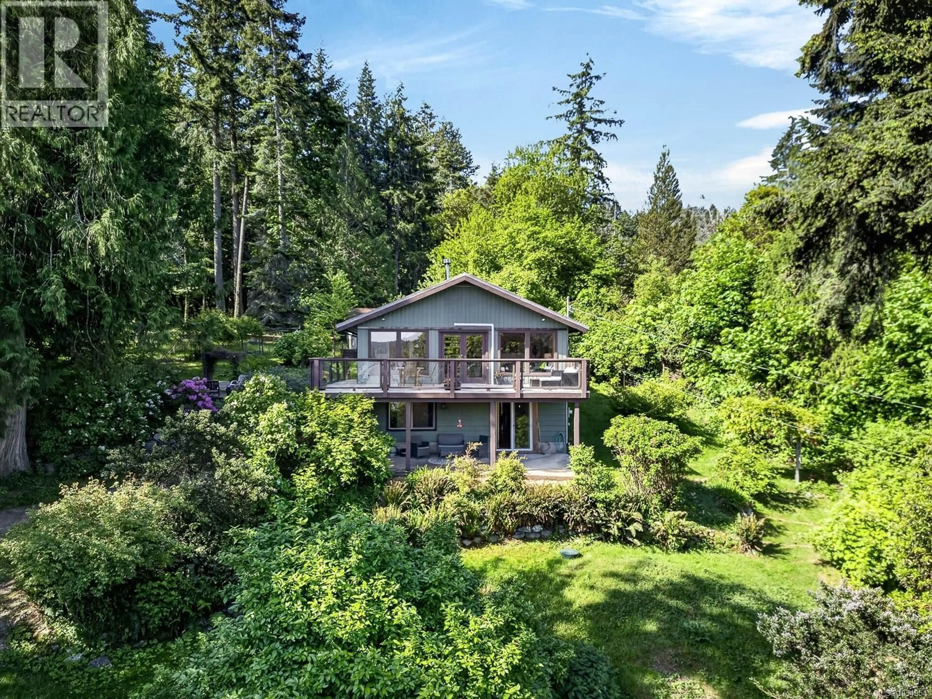A pic from outside/outdoor area/front of a property/back of a property/a pic from drone, water/lake/river/ocean view for 206 ROLAND ROAD, Salt Spring British Columbia V8K2B7