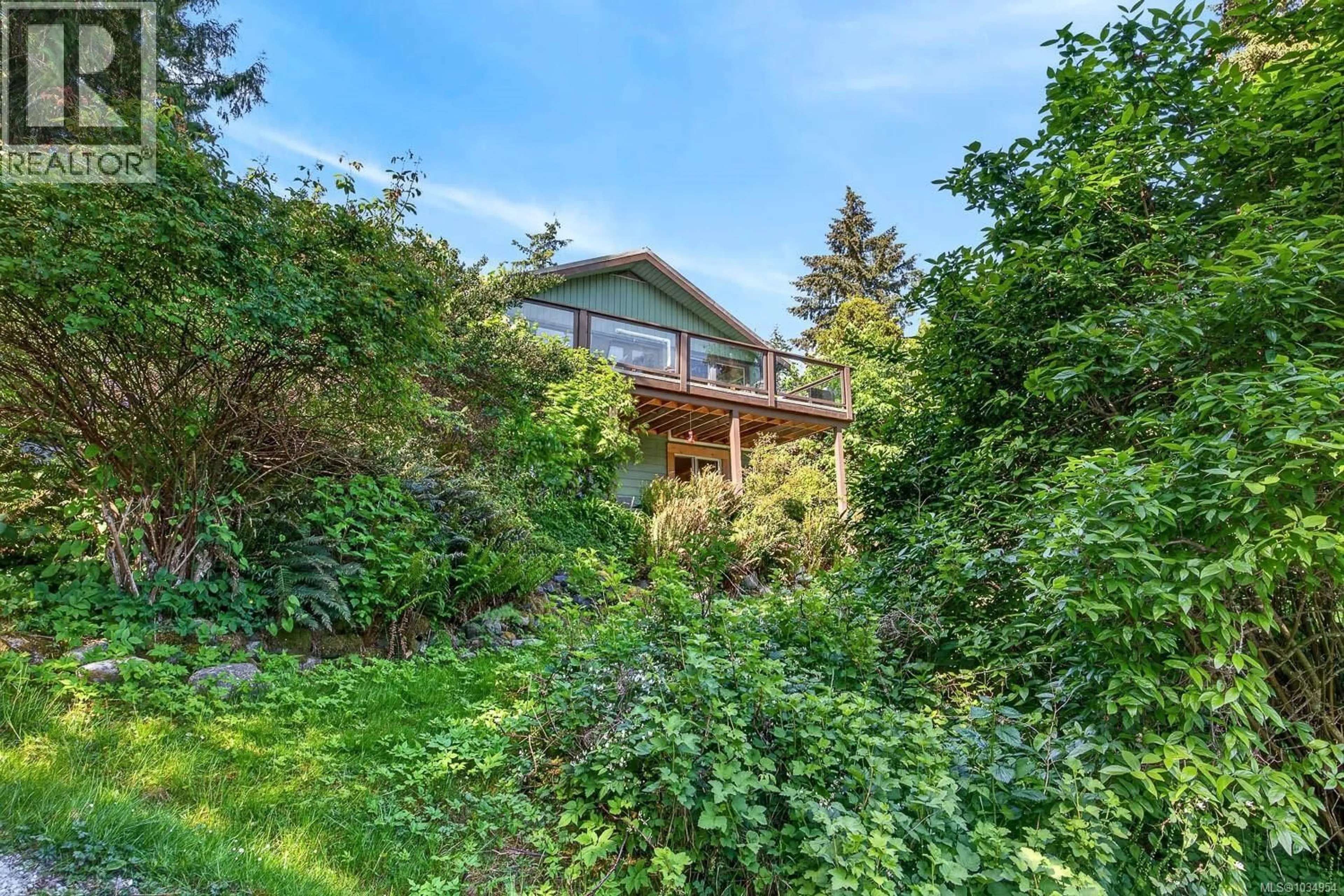 A pic from outside/outdoor area/front of a property/back of a property/a pic from drone, water/lake/river/ocean view for 206 ROLAND ROAD, Salt Spring British Columbia V8K2B7