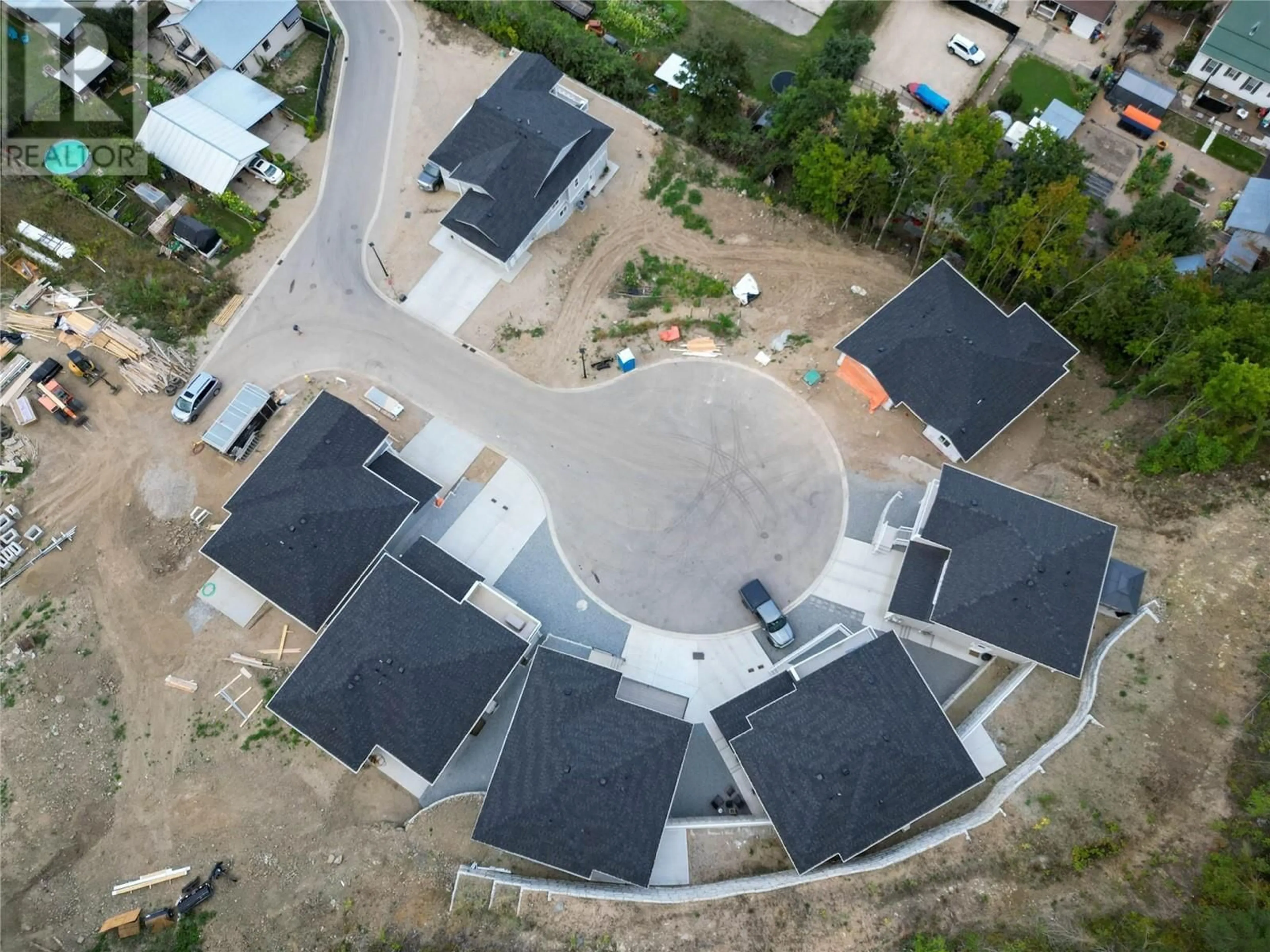 A pic from outside/outdoor area/front of a property/back of a property/a pic from drone, street for 104 - 806 CLIFF AVENUE, Enderby British Columbia V0E1V1