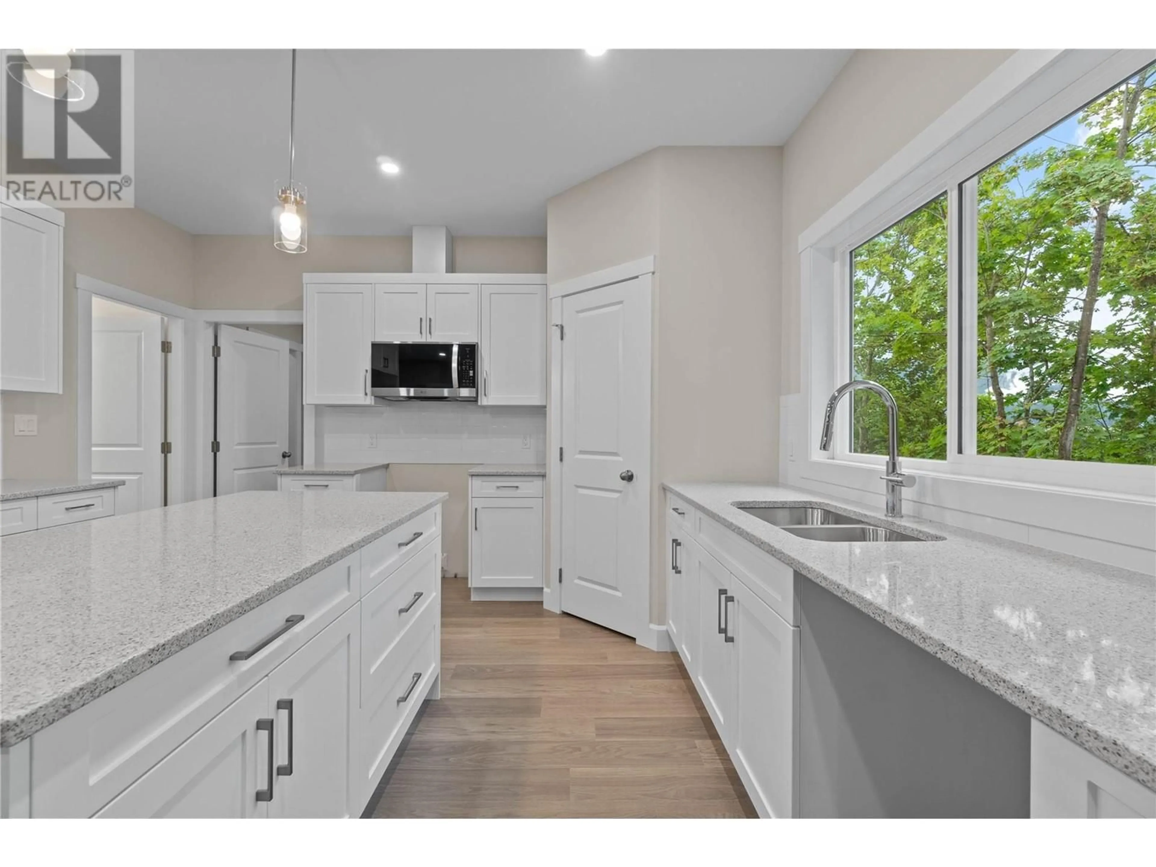 Open concept kitchen, ceramic/tile floor for 104 - 806 CLIFF AVENUE, Enderby British Columbia V0E1V1