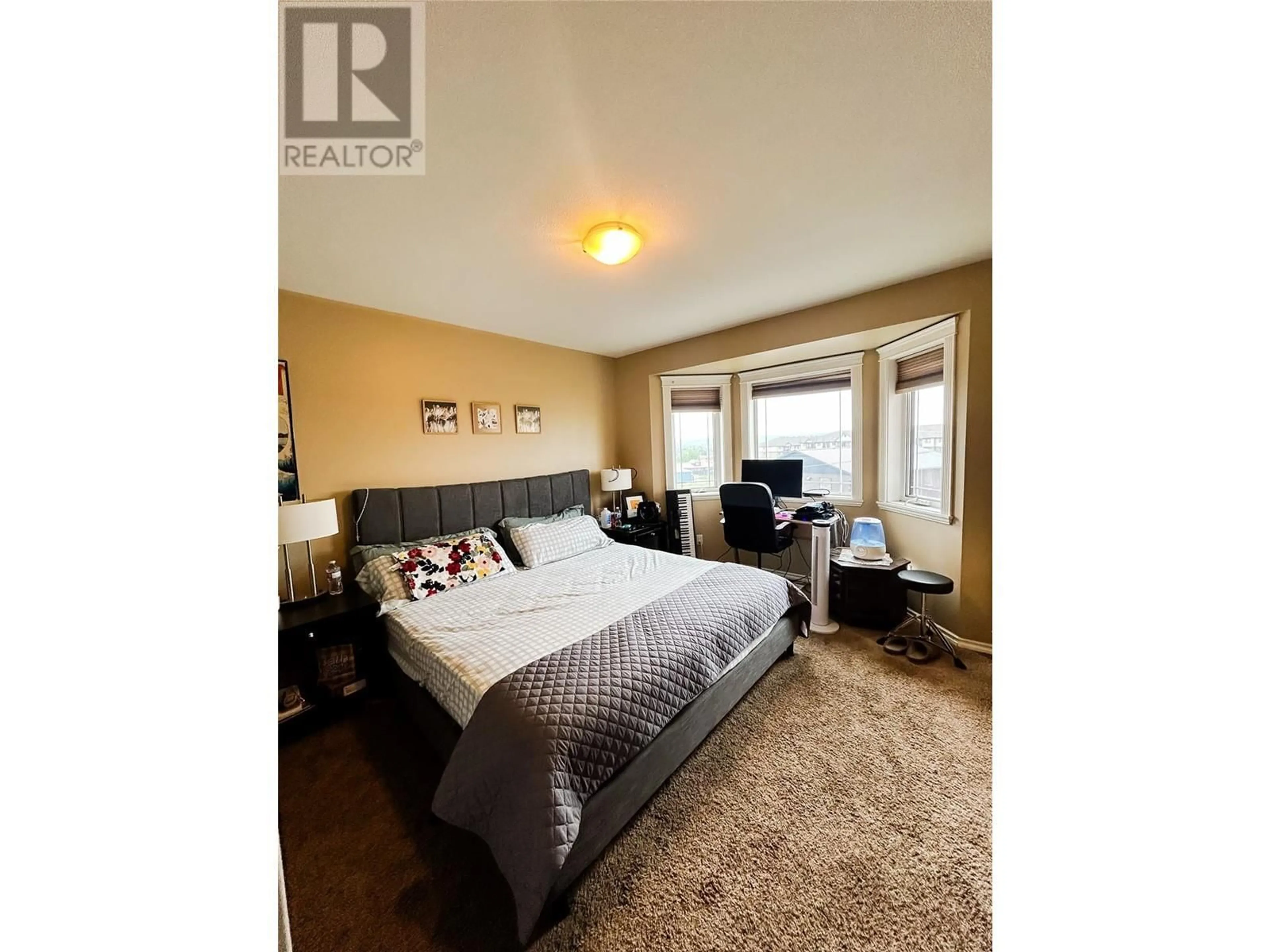 Bedroom with bed, unknown for 721 100 AVENUE, Dawson Creek British Columbia V1G0B5