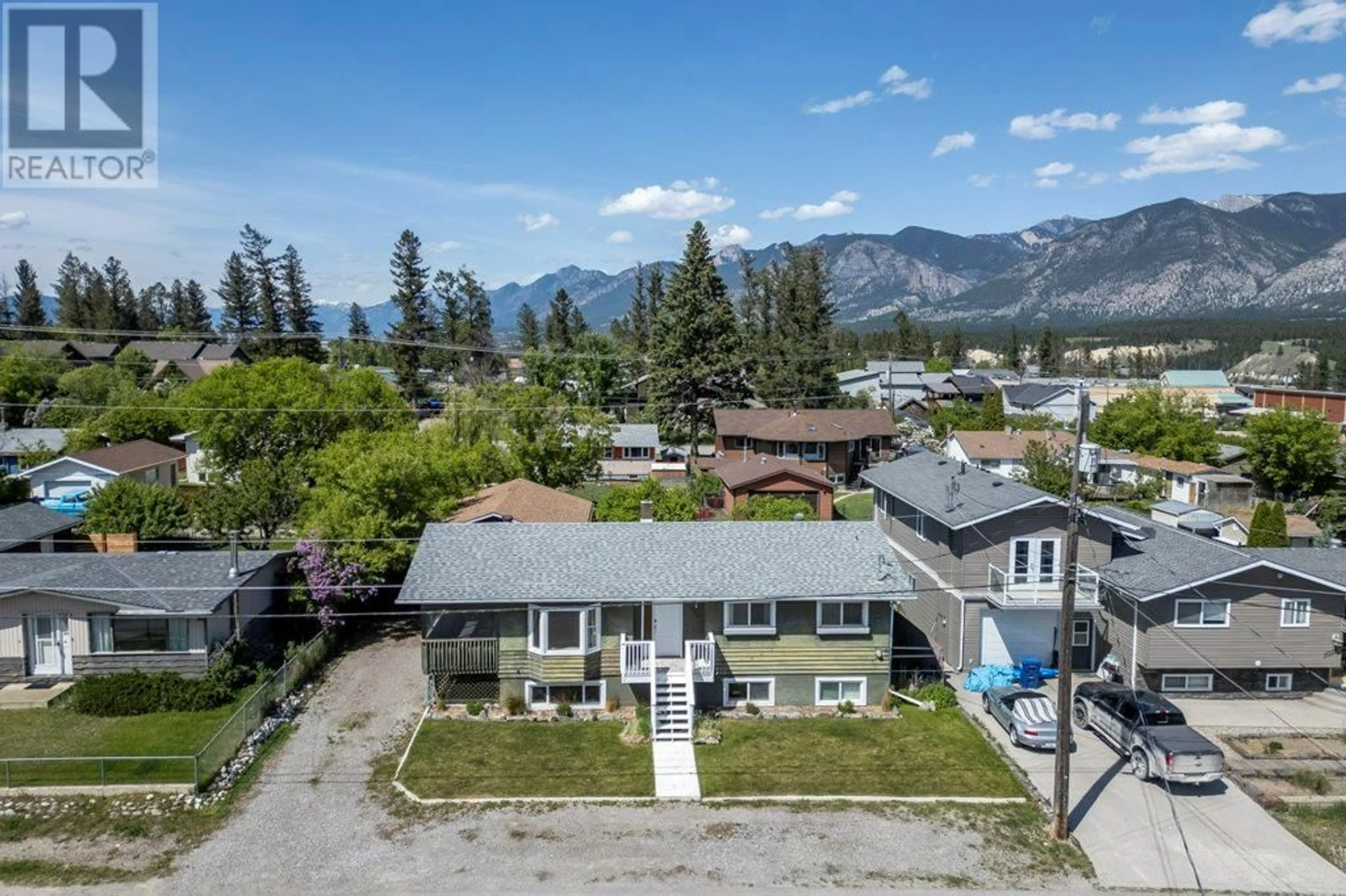 A pic from outside/outdoor area/front of a property/back of a property/a pic from drone, mountain view for 1028 6 STREET, Invermere British Columbia V0A1K0