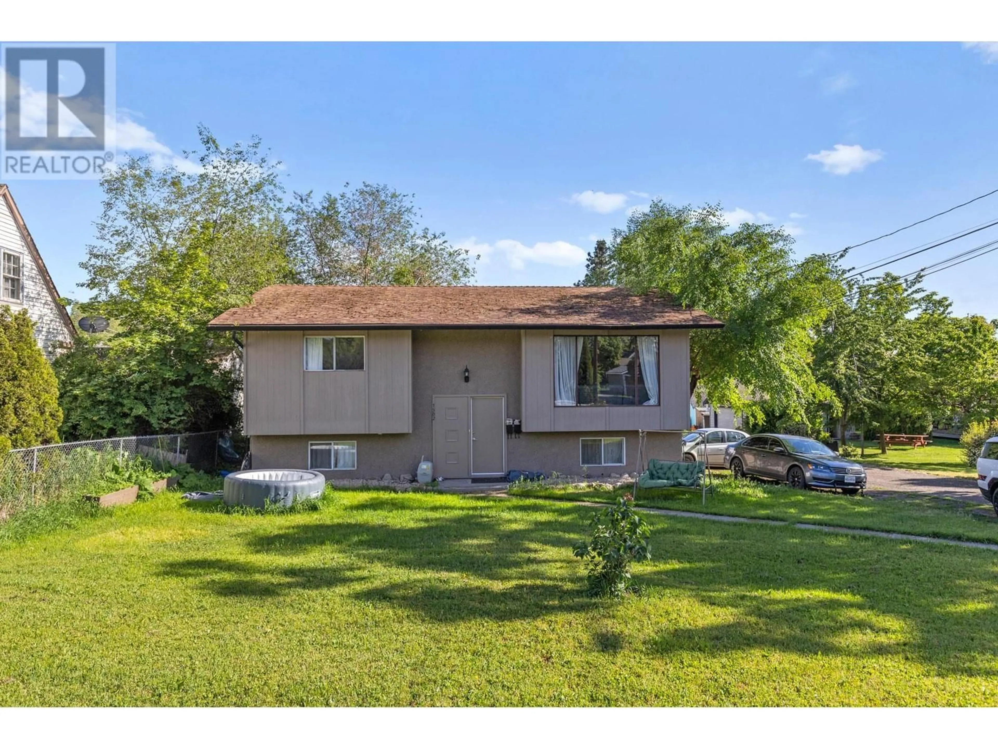 A pic from outside/outdoor area/front of a property/back of a property/a pic from drone, street for 1502 32 AVENUE, Vernon British Columbia V1T2H8