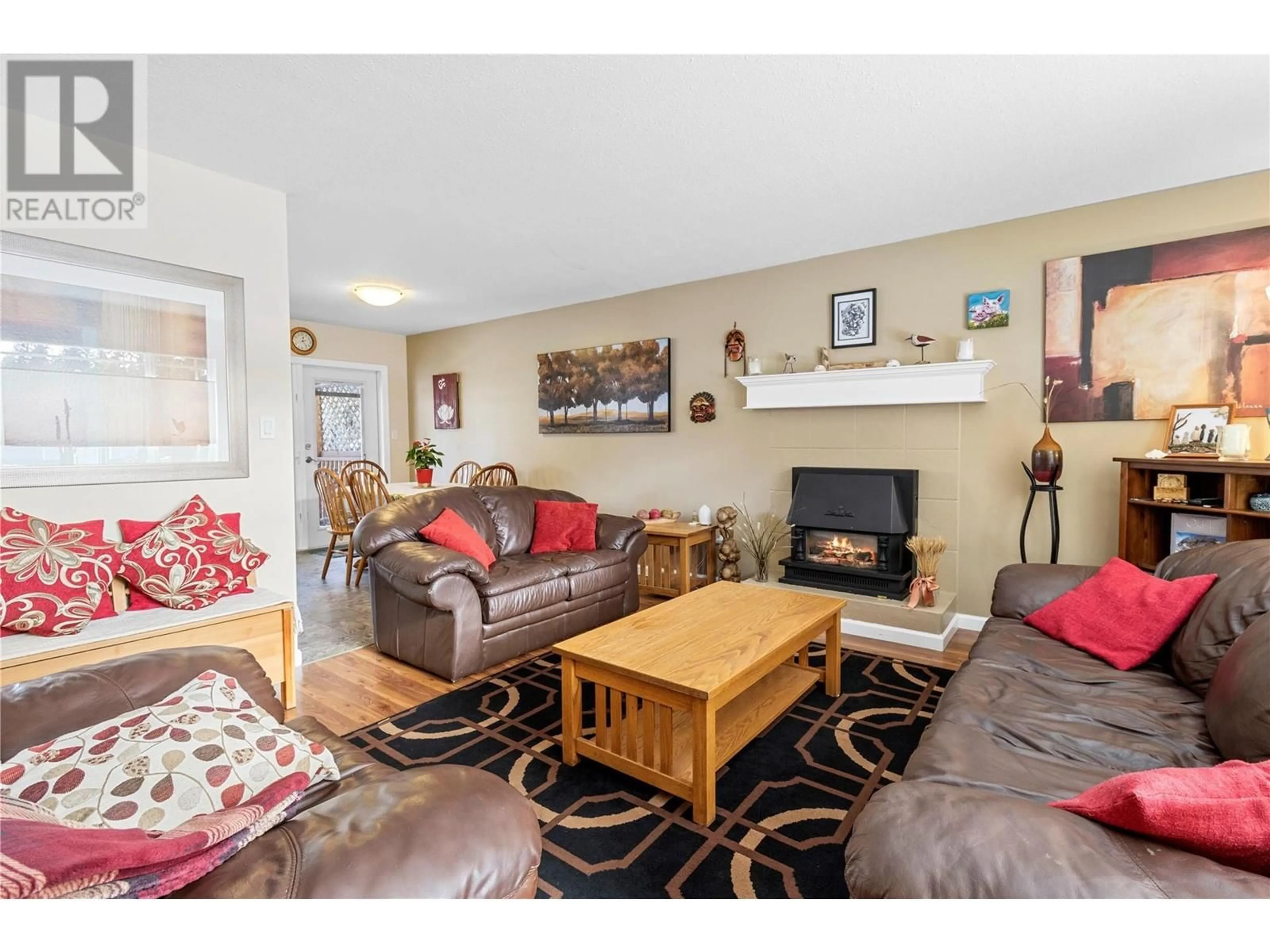 Living room with furniture, wood/laminate floor for 4651 71 AVENUE NORTHEAST, Salmon Arm British Columbia V0E1K0
