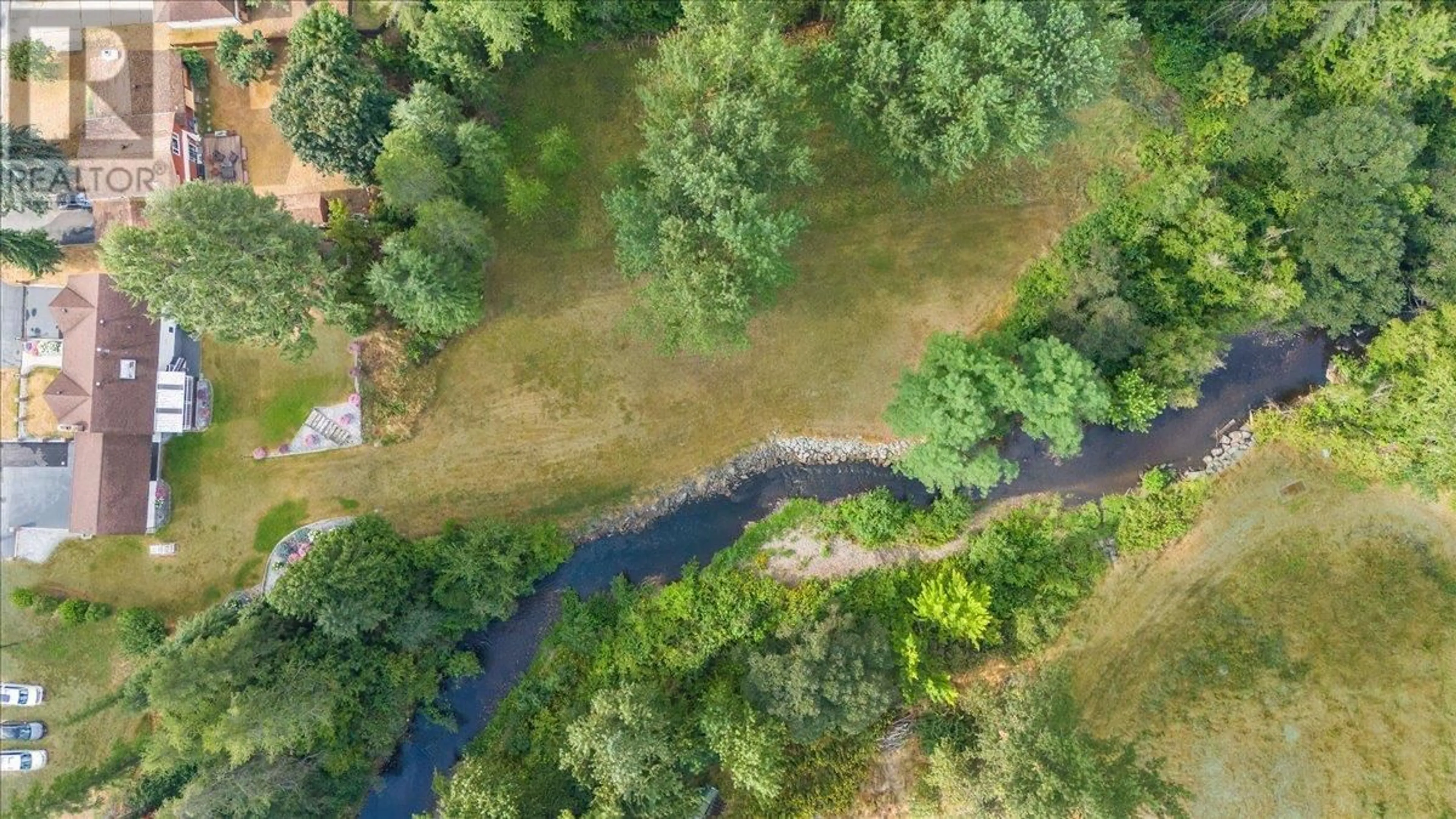 A pic from outside/outdoor area/front of a property/back of a property/a pic from drone, forest/trees view for 1731 BARRETT DRIVE, Fruitvale British Columbia V0G1L0