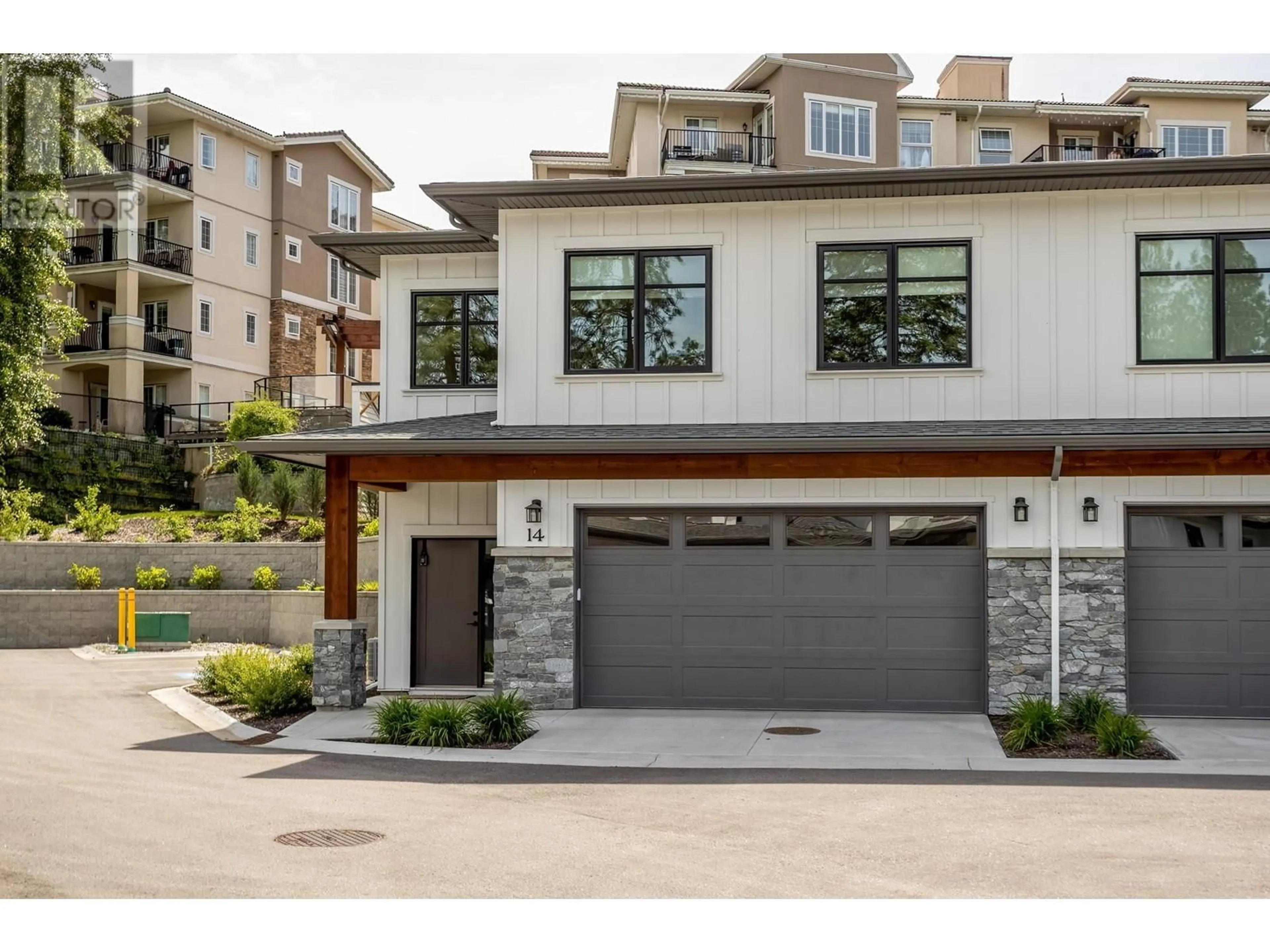 Home with brick exterior material, street for 14 - 1979 COUNTRY CLUB DRIVE, Kelowna British Columbia V1V0H6
