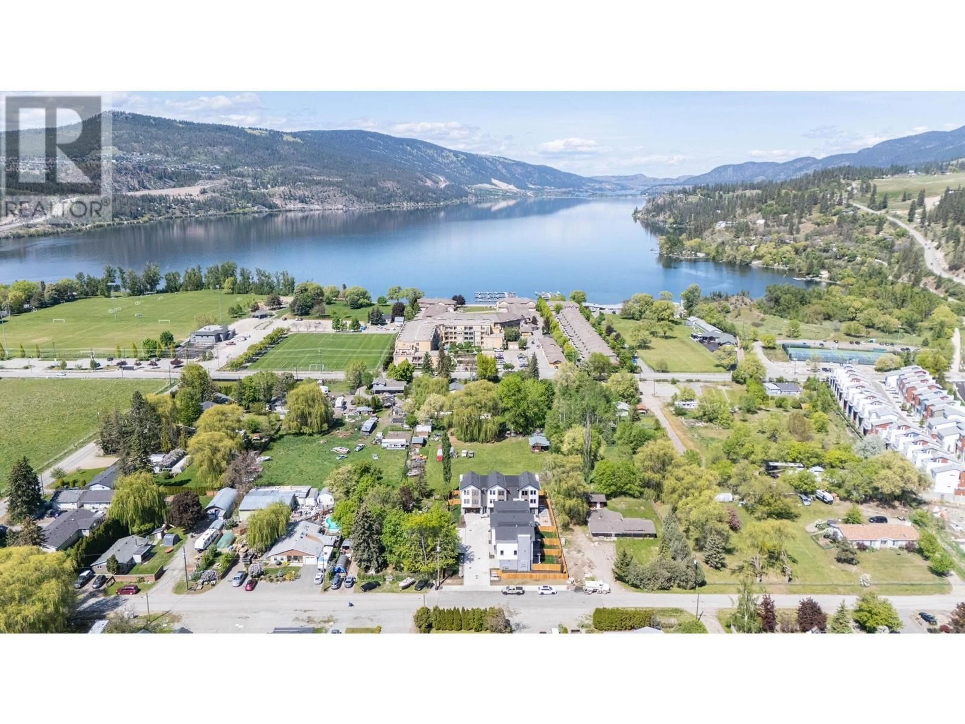 A pic from outside/outdoor area/front of a property/back of a property/a pic from drone, water/lake/river/ocean view for 3 - 3590 REDECOPP ROAD, Lake Country British Columbia V4V1X5