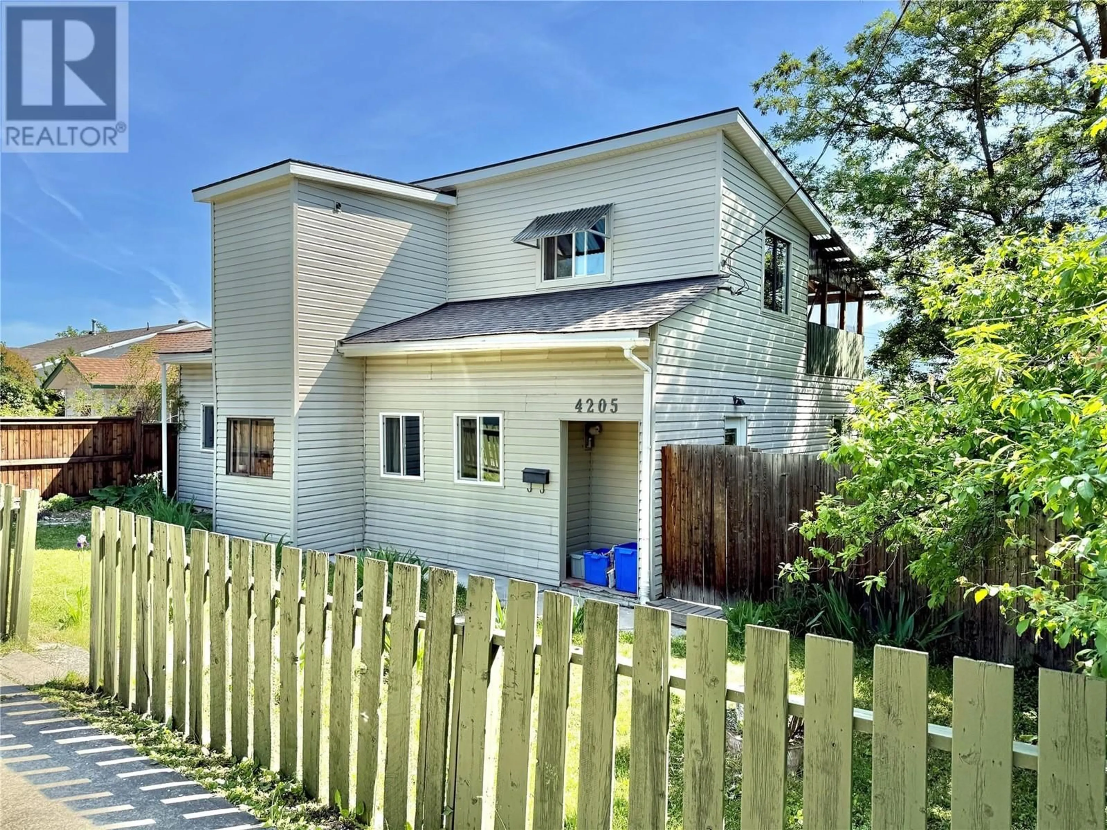 A pic from outside/outdoor area/front of a property/back of a property/a pic from drone, street for 4205 34 STREET, Vernon British Columbia V1T5Y5