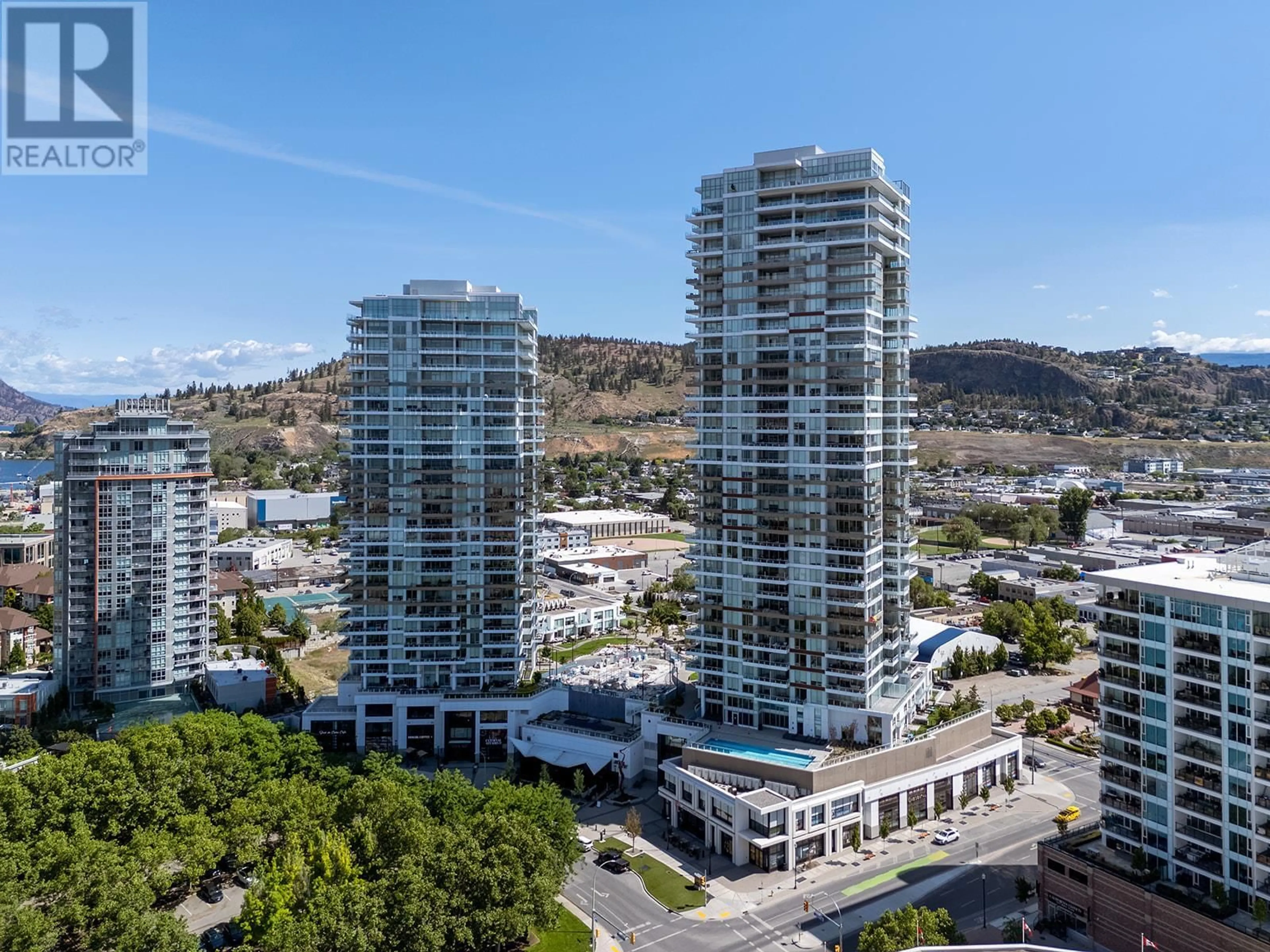 A pic from outside/outdoor area/front of a property/back of a property/a pic from drone, city buildings view from balcony for 802 - 1191 SUNSET DRIVE, Kelowna British Columbia V1Y0J4