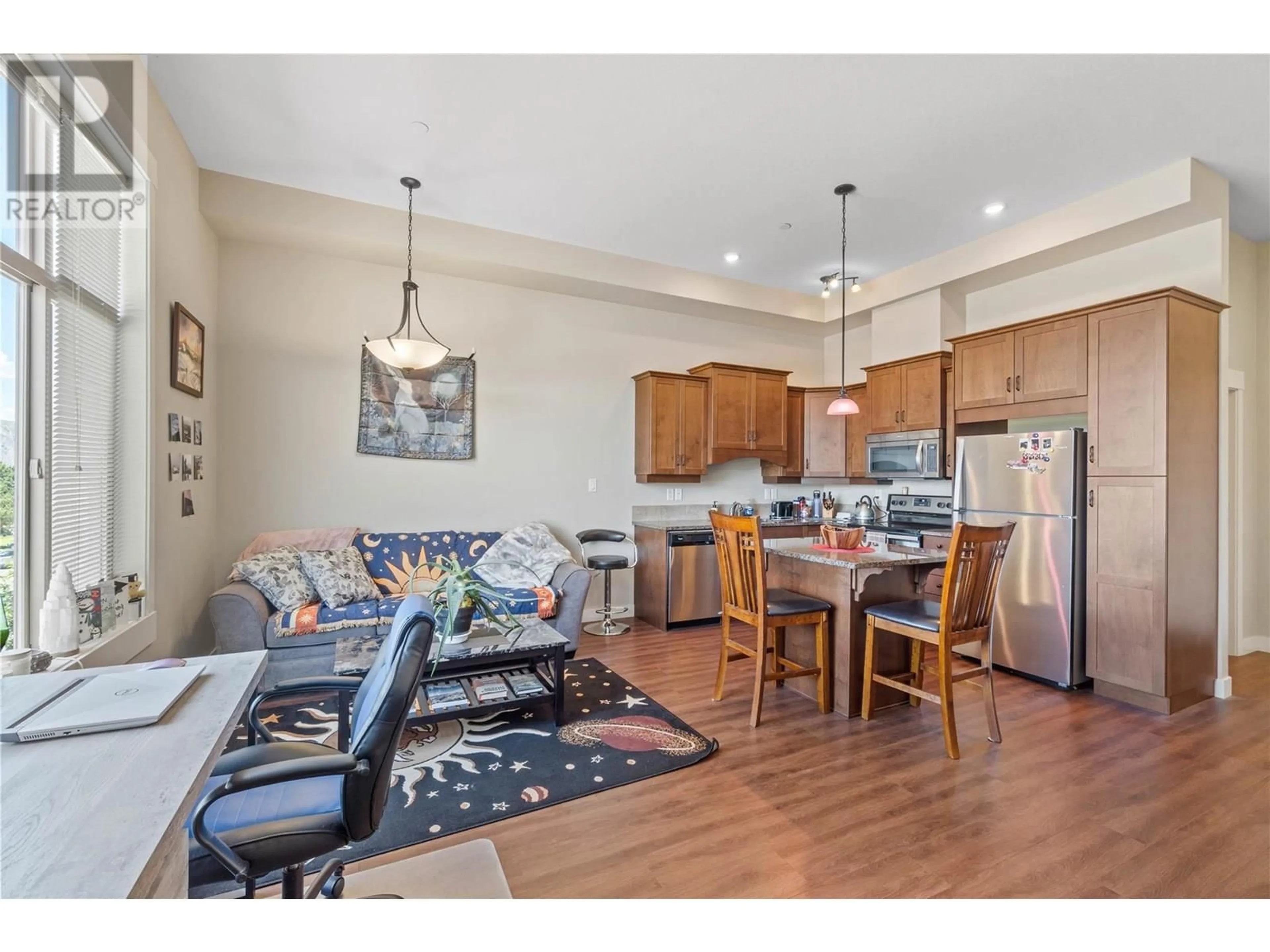 Open concept kitchen, wood/laminate floor for 216 - 755 MCGILL ROAD, Kamloops British Columbia V2C0B6