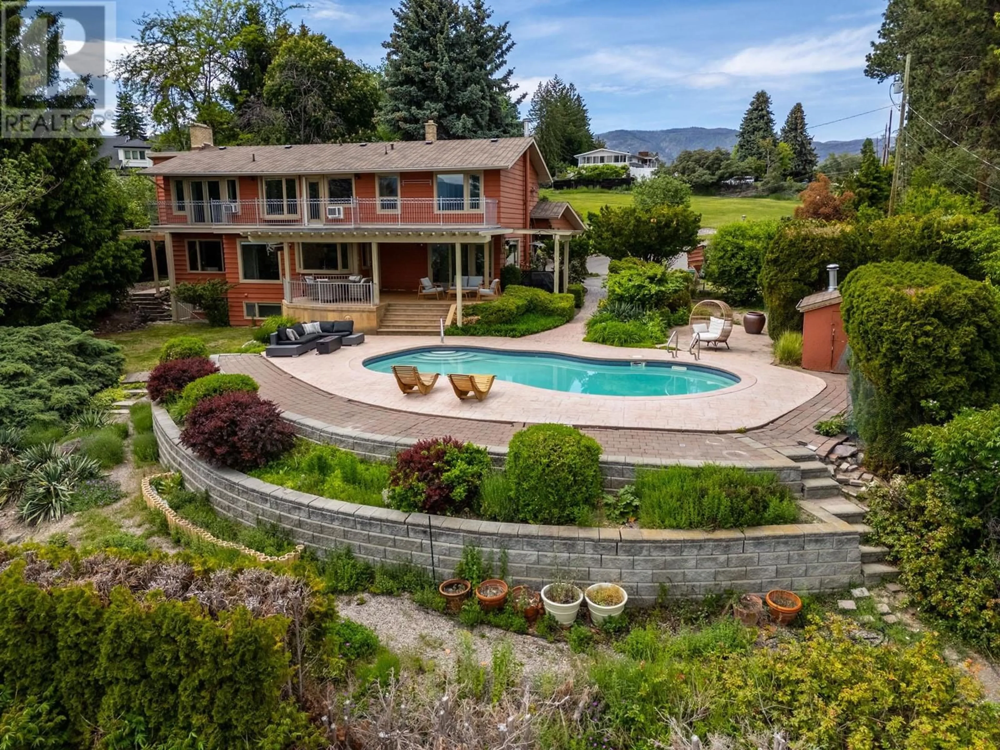 A pic from outside/outdoor area/front of a property/back of a property/a pic from drone, water/lake/river/ocean view for BEVERLY PLACE, West Kelowna British Columbia V1Z2A5