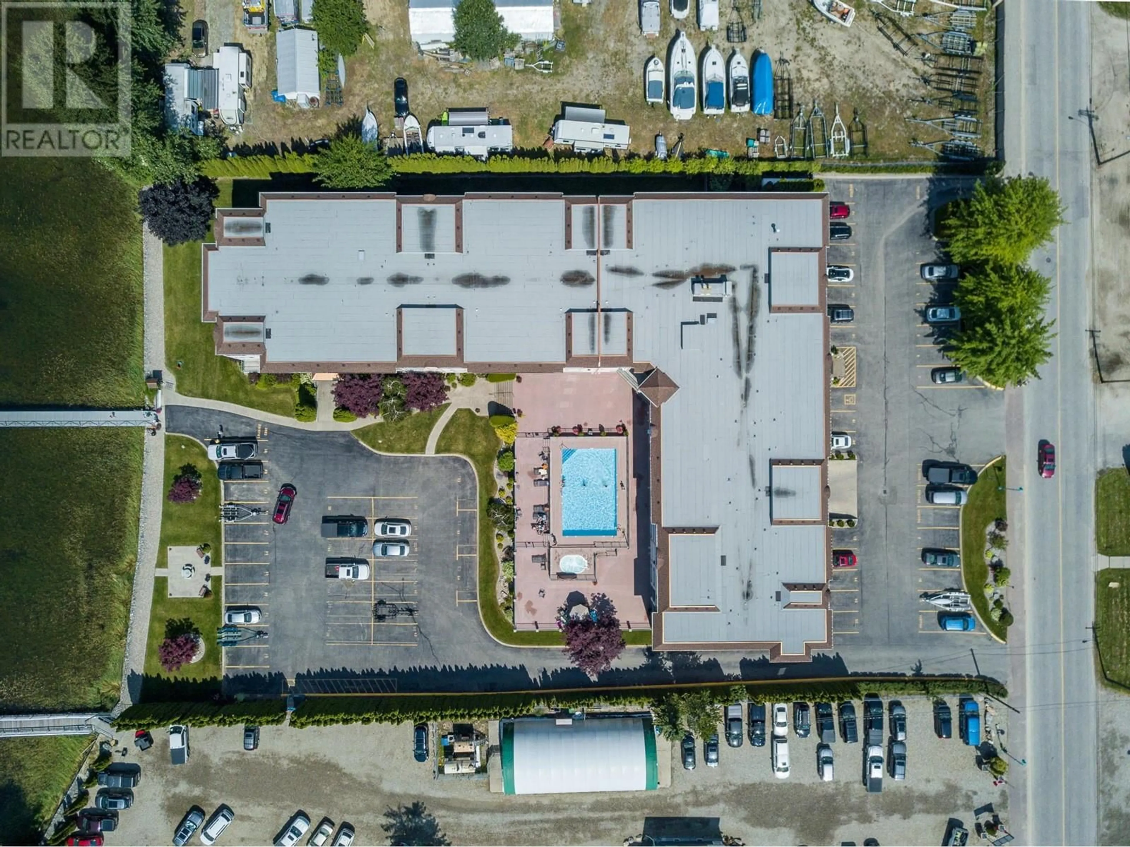 A pic from outside/outdoor area/front of a property/back of a property/a pic from drone, building for 221 - 1002 RIVERSIDE AVENUE, Sicamous British Columbia V0E2V0