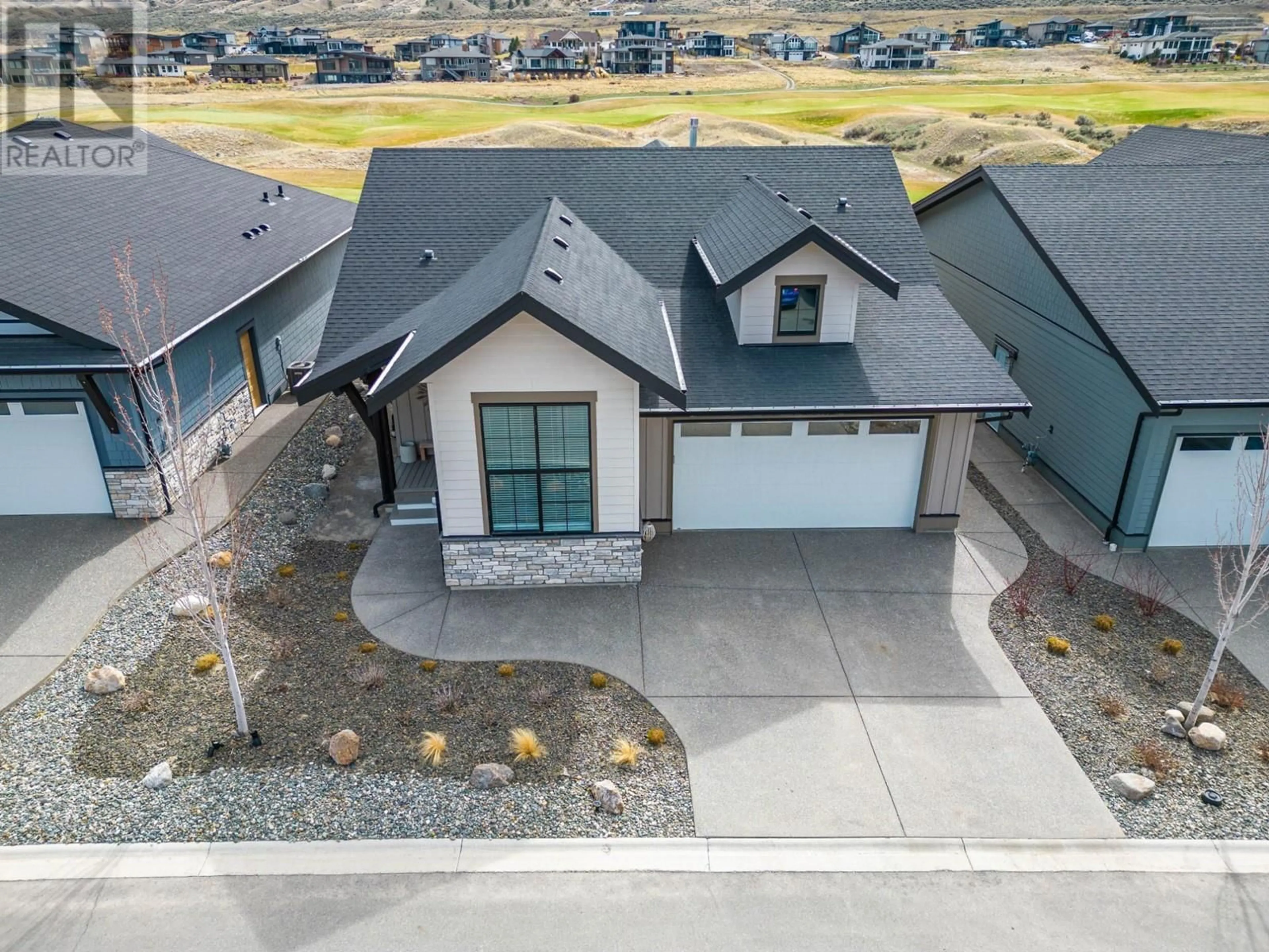A pic from outside/outdoor area/front of a property/back of a property/a pic from drone, street for 2 - 260 RUE CHEVAL NOIR OTHER, Kamloops British Columbia V1S0G1