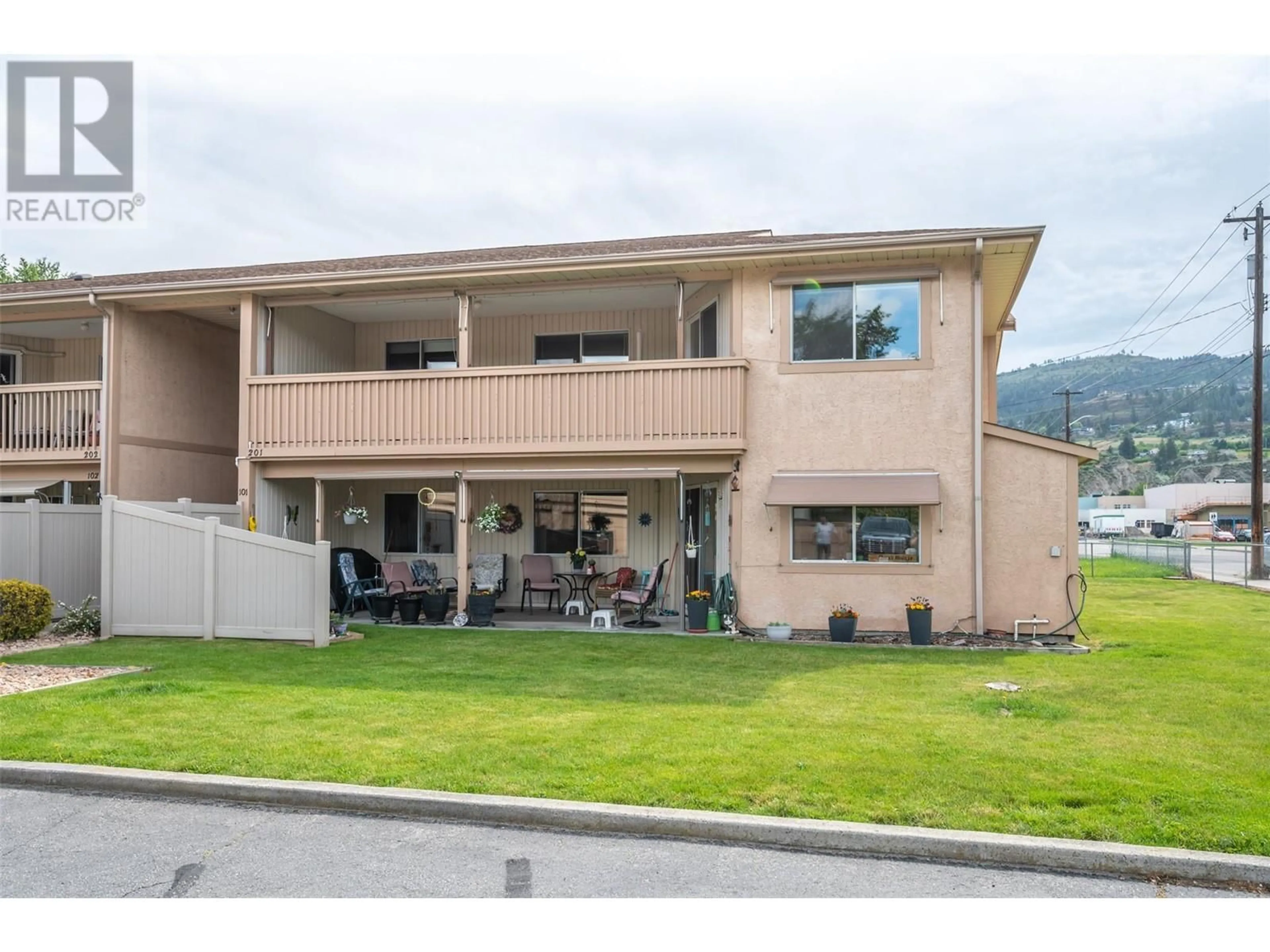 Home with vinyl exterior material, mountain view for 201 - 157 GREEN AVENUE WEST, Penticton British Columbia V2A3S9