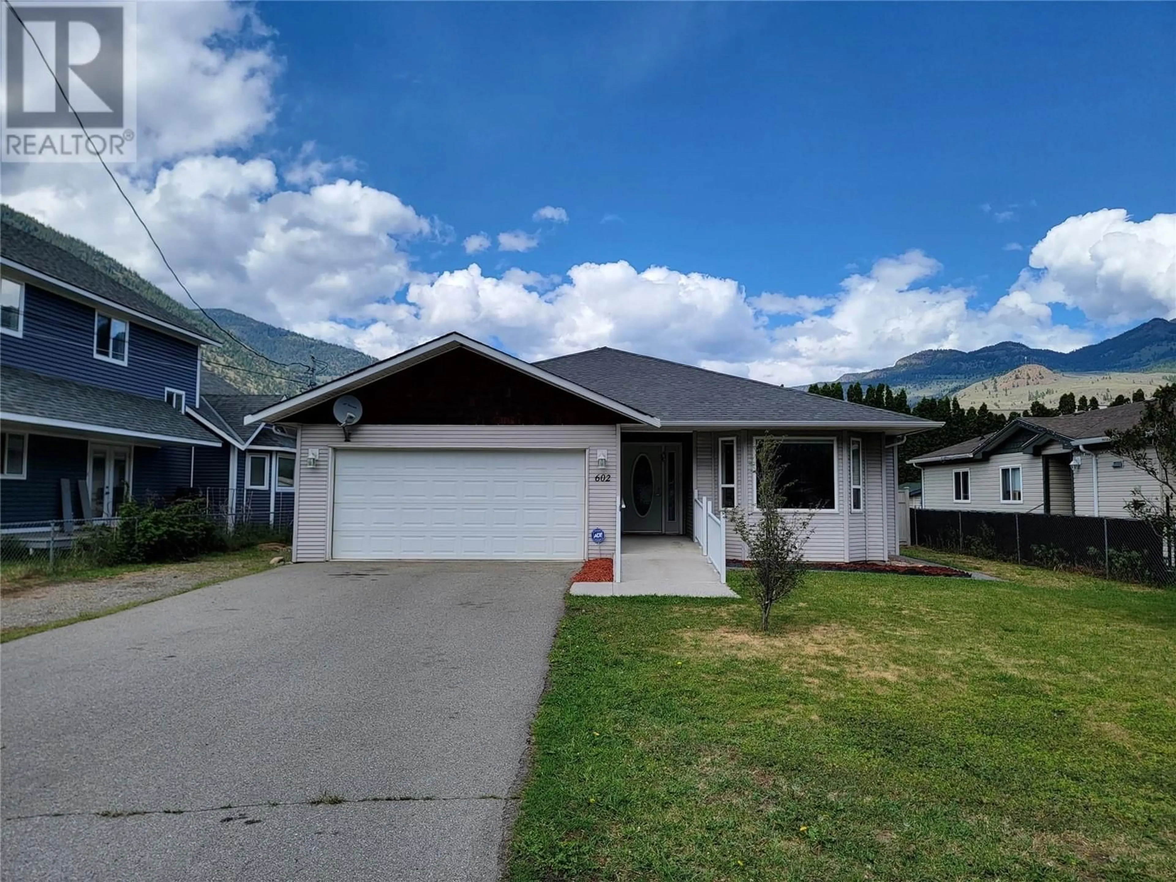 Home with vinyl exterior material, mountain view for 602 10TH AVENUE, Keremeos British Columbia V0N1N0