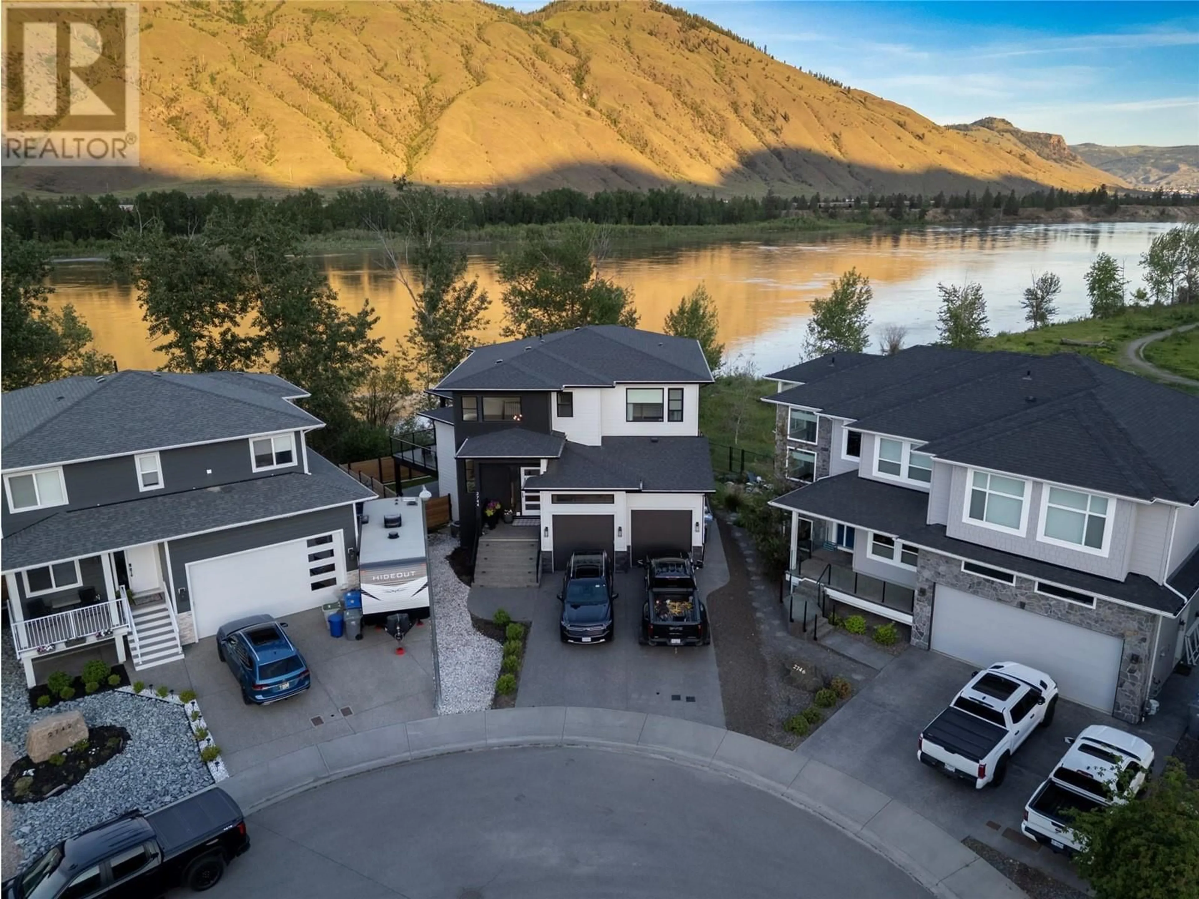 A pic from outside/outdoor area/front of a property/back of a property/a pic from drone, water/lake/river/ocean view for 2744 BEACHMOUNT CRESCENT, Kamloops British Columbia V2B0E6