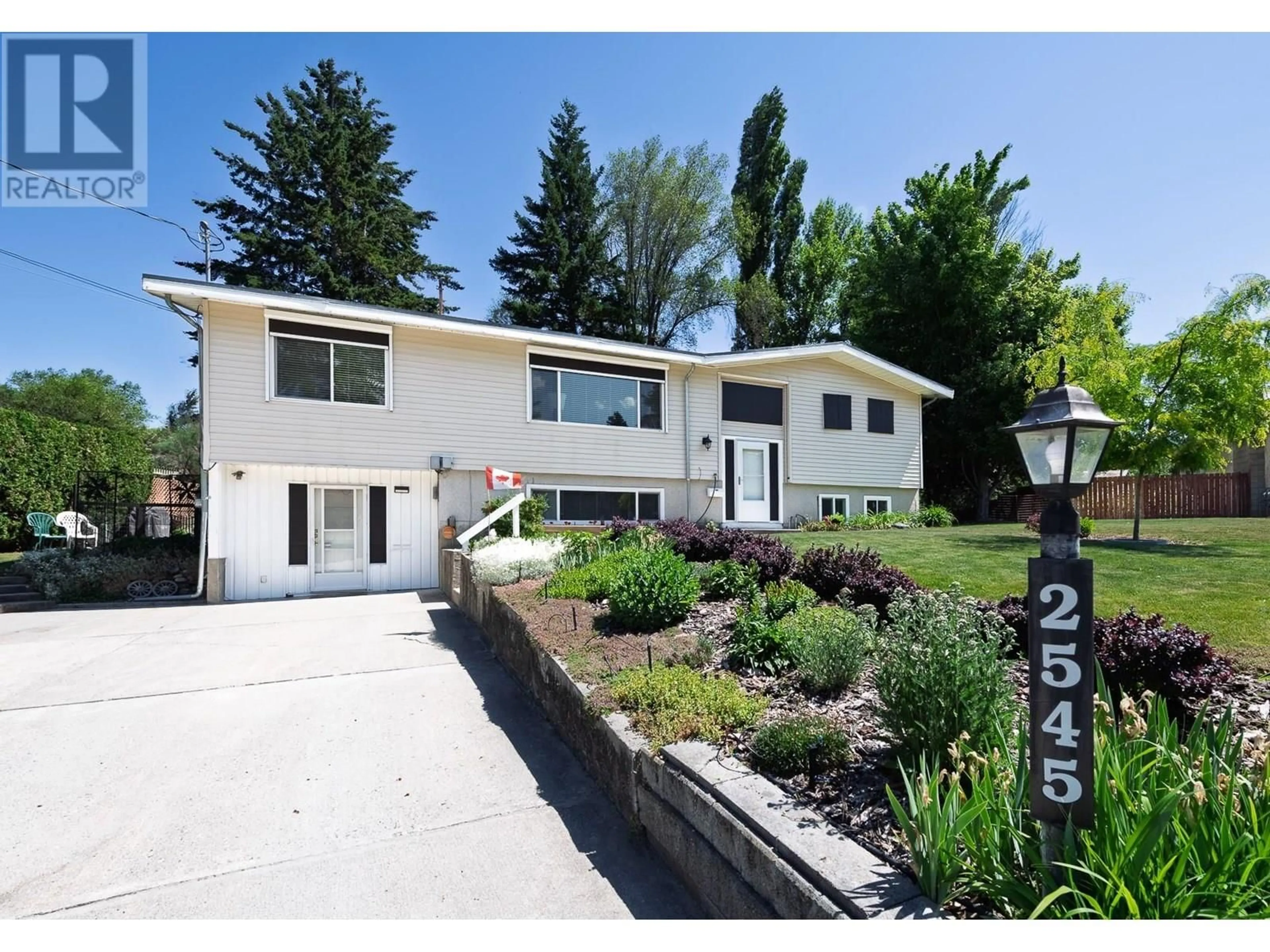 Home with vinyl exterior material, street for 2545 COLLEEN ROAD, West Kelowna British Columbia V1Z2K6