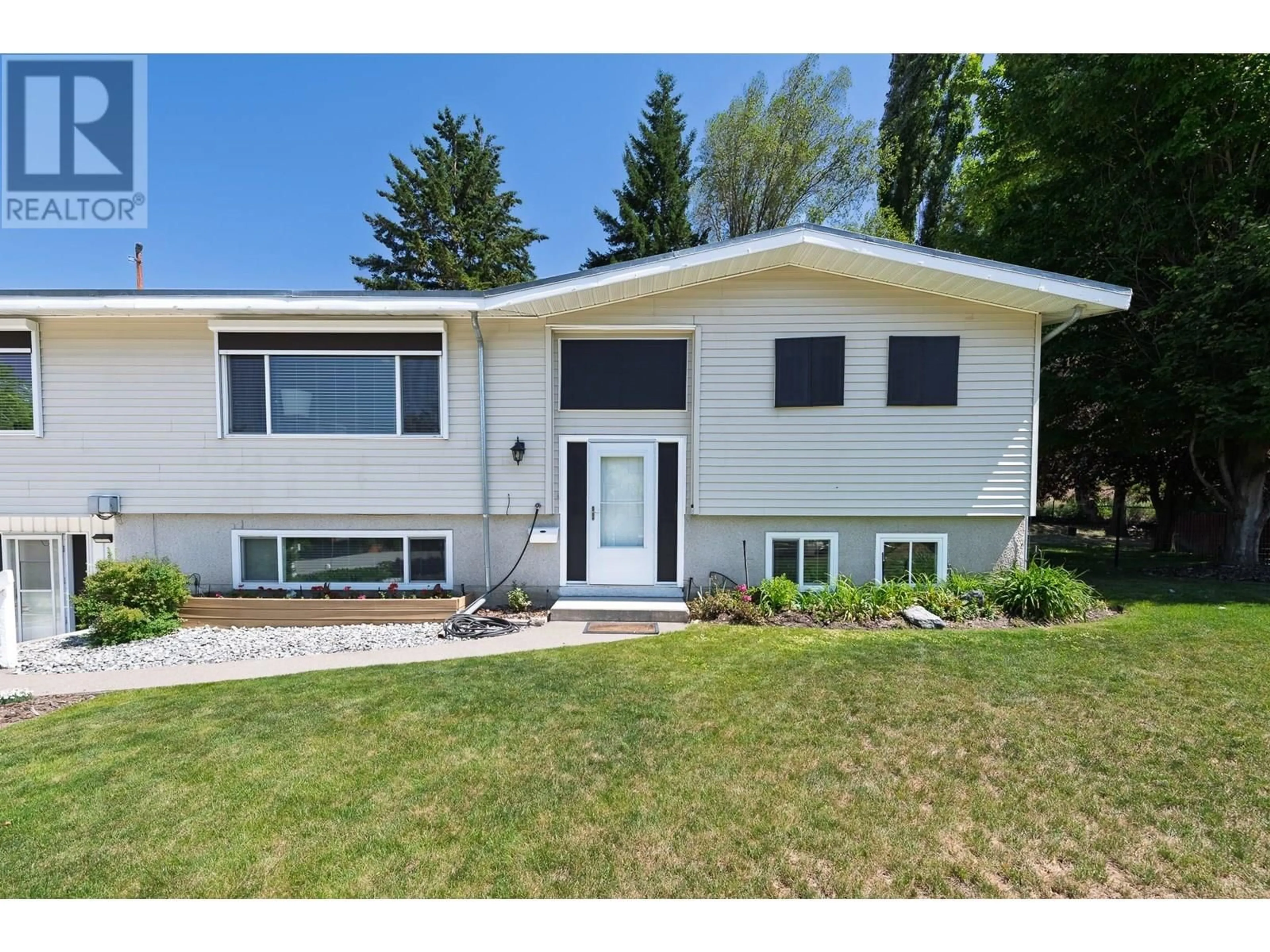 Home with vinyl exterior material, street for 2545 COLLEEN ROAD, West Kelowna British Columbia V1Z2K6