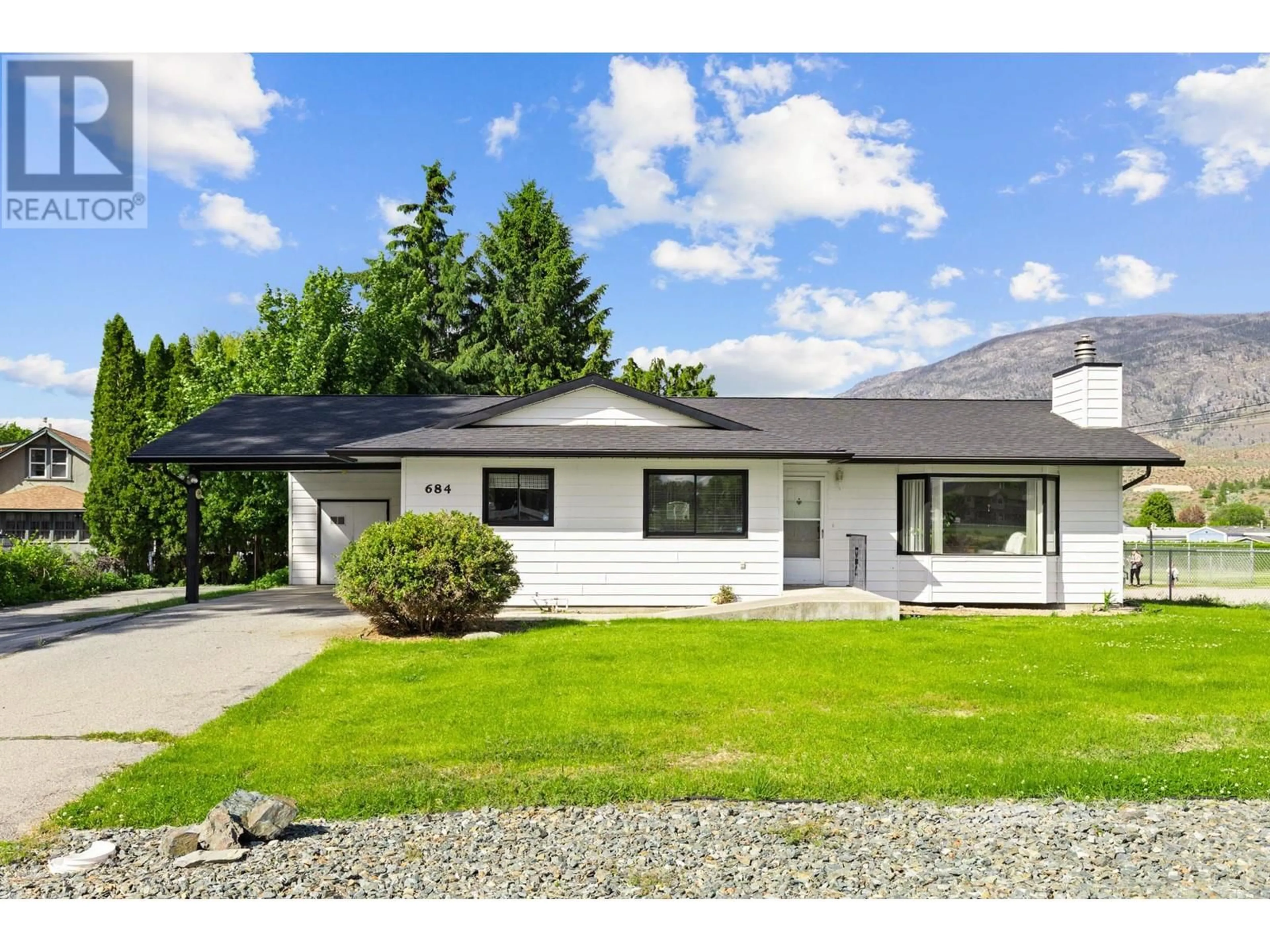 Home with vinyl exterior material, street for 684 MERLOT AVENUE, Oliver British Columbia V0H1T4