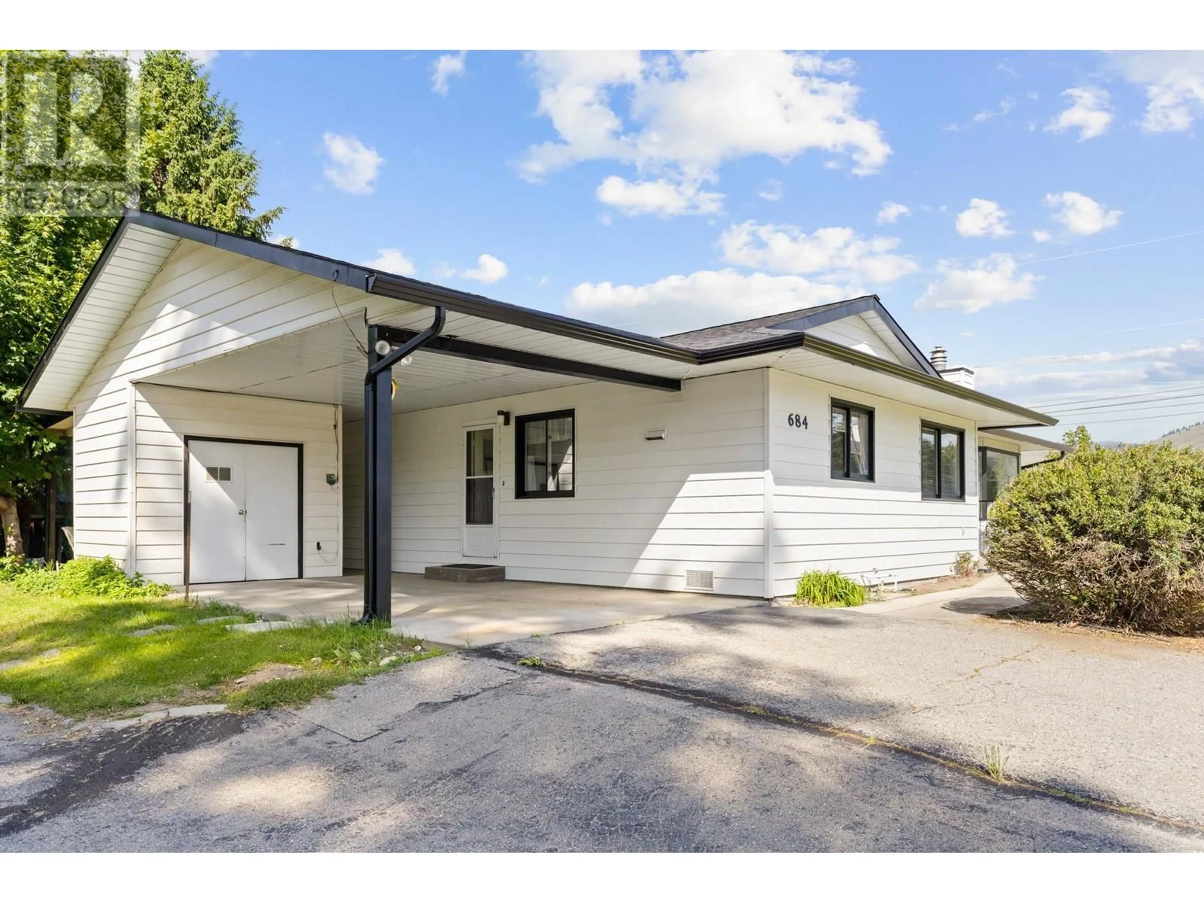 Home with vinyl exterior material, street for 684 MERLOT AVENUE, Oliver British Columbia V0H1T4