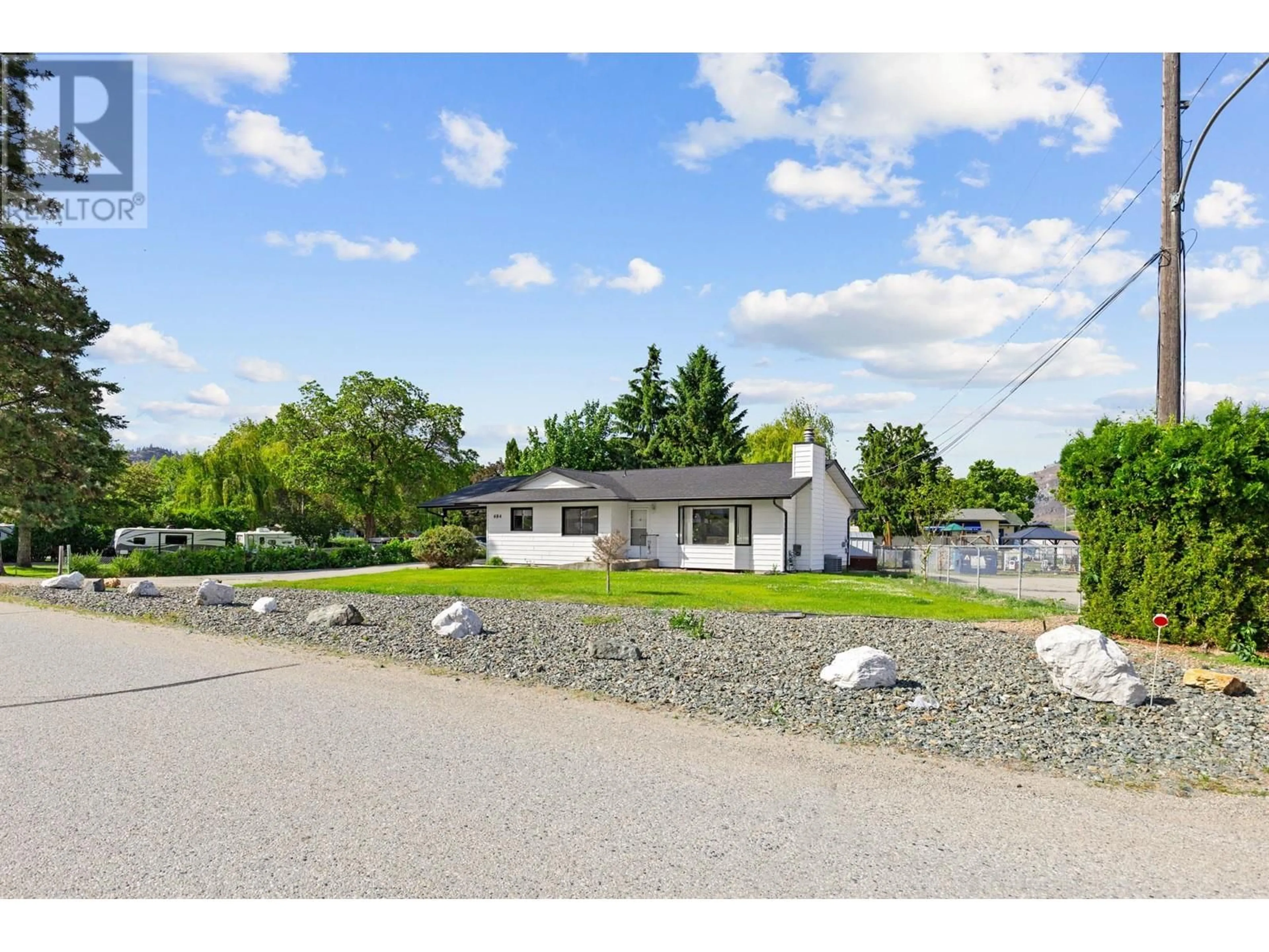 A pic from outside/outdoor area/front of a property/back of a property/a pic from drone, water/lake/river/ocean view for 684 MERLOT AVENUE, Oliver British Columbia V0H1T4