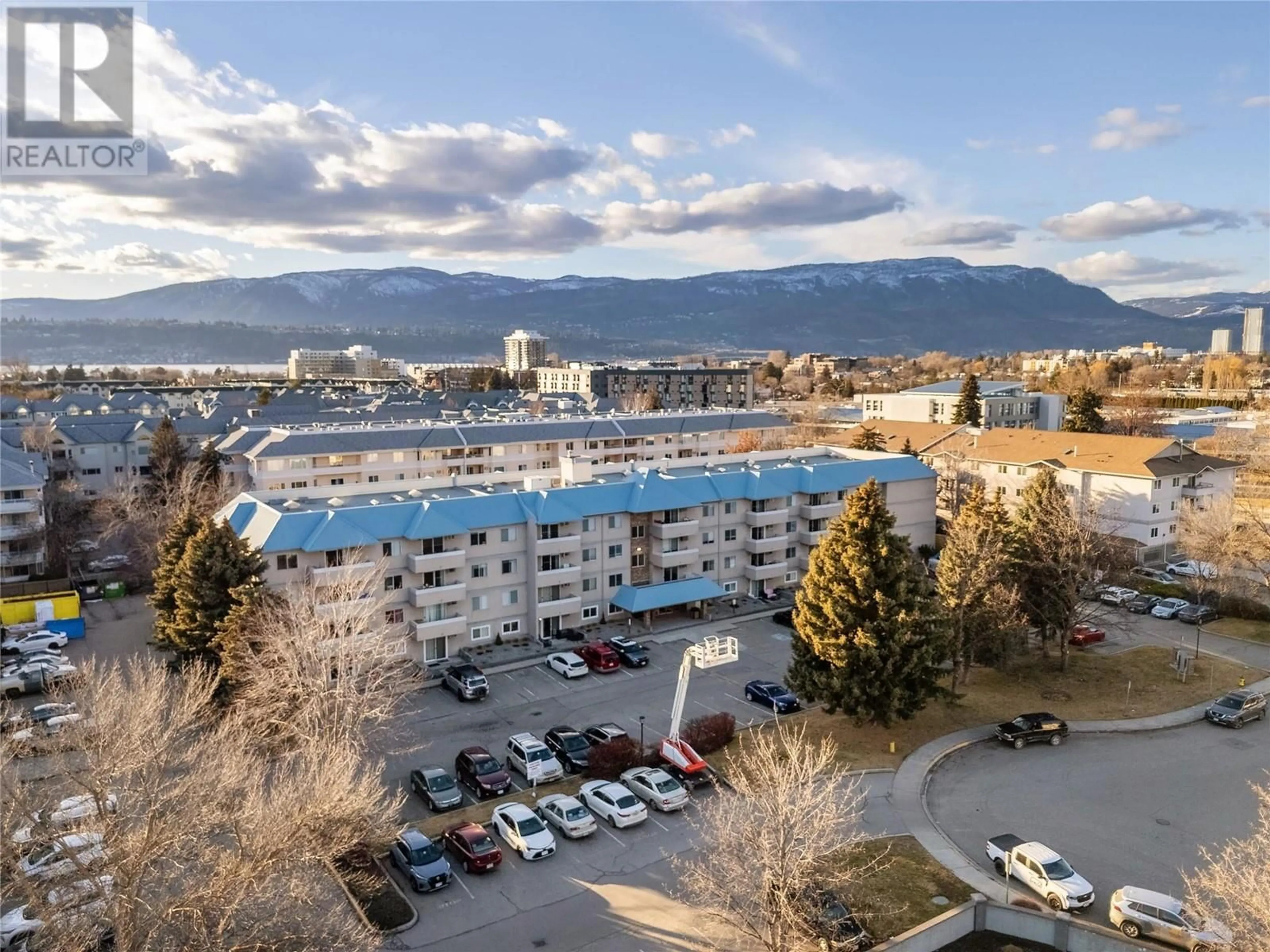 A pic from outside/outdoor area/front of a property/back of a property/a pic from drone, mountain view for 208 - 3160 DE MONTREUIL COURT, Kelowna British Columbia V1W3W3
